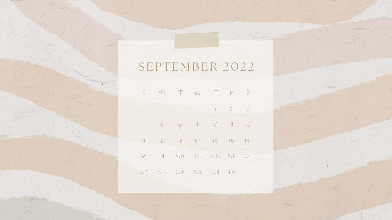 Neutral Desktop 桌布 壁紙 — 一張極簡風格的2022年9月日曆頁面，用膠帶貼在帶有紋理的米白色波浪背景上。