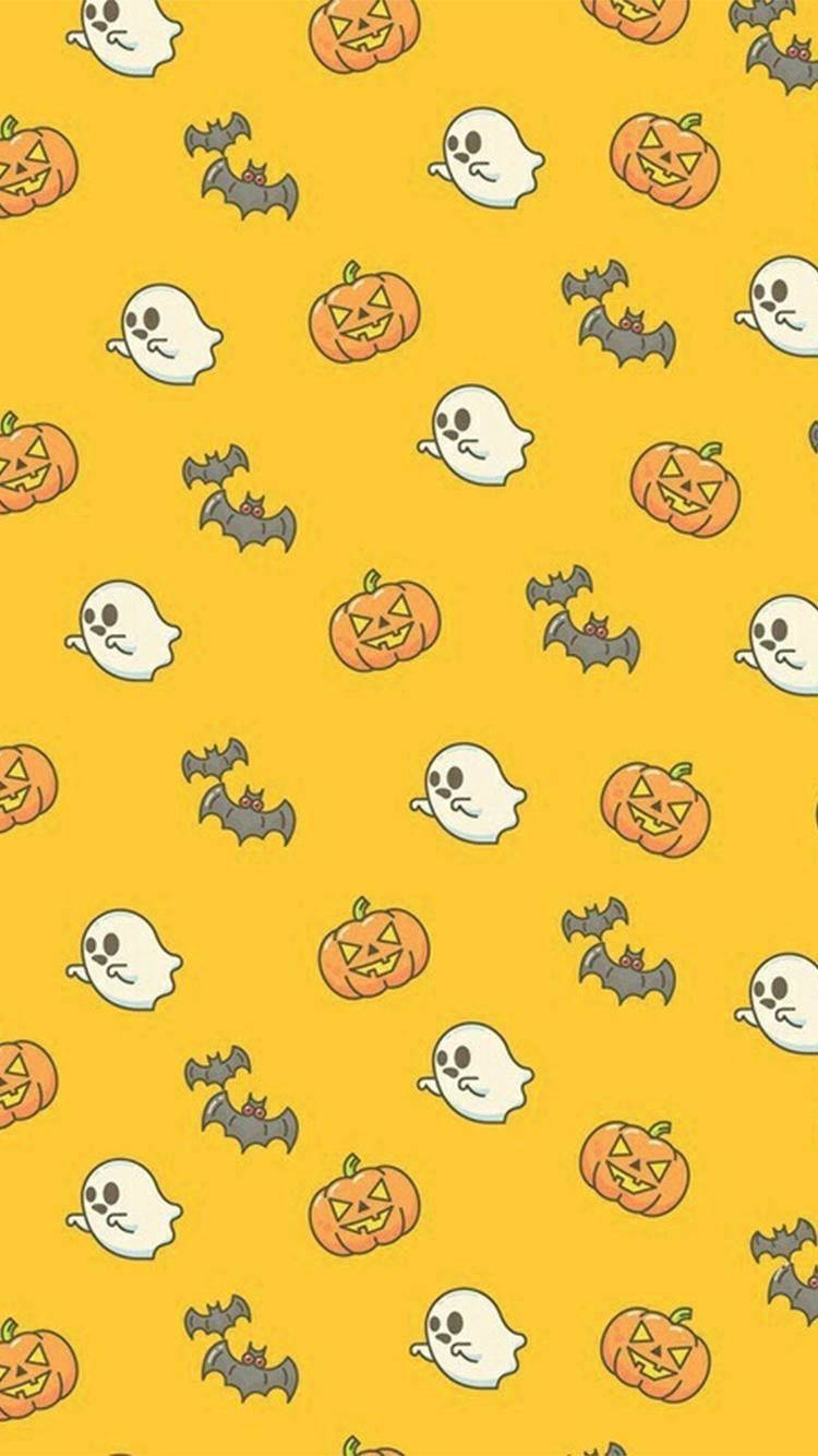 Scary Halloween iPhone 桌布 壁紙 — 一張歡樂的萬聖節桌布，可愛的鬼魂、南瓜和蝙蝠散落在明亮的黃色背景上。