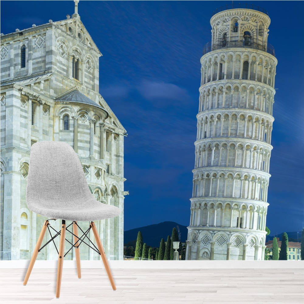 Furniture 桌布 壁紙 — 一張現代米色椅子放在充滿活力的藍天背景前，背景是比薩的標誌性斜塔和大教堂。
