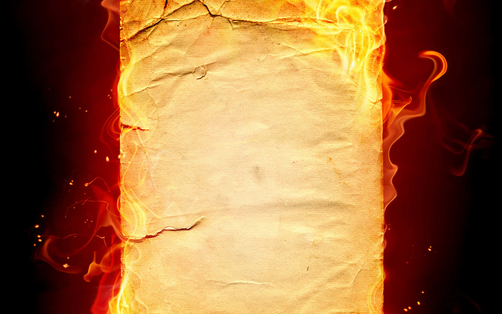 Flame 桌布 壁紙 — 一張皺巴巴的羊皮紙在深色背景上沿邊緣燃燒著鮮豔的橙色火焰。