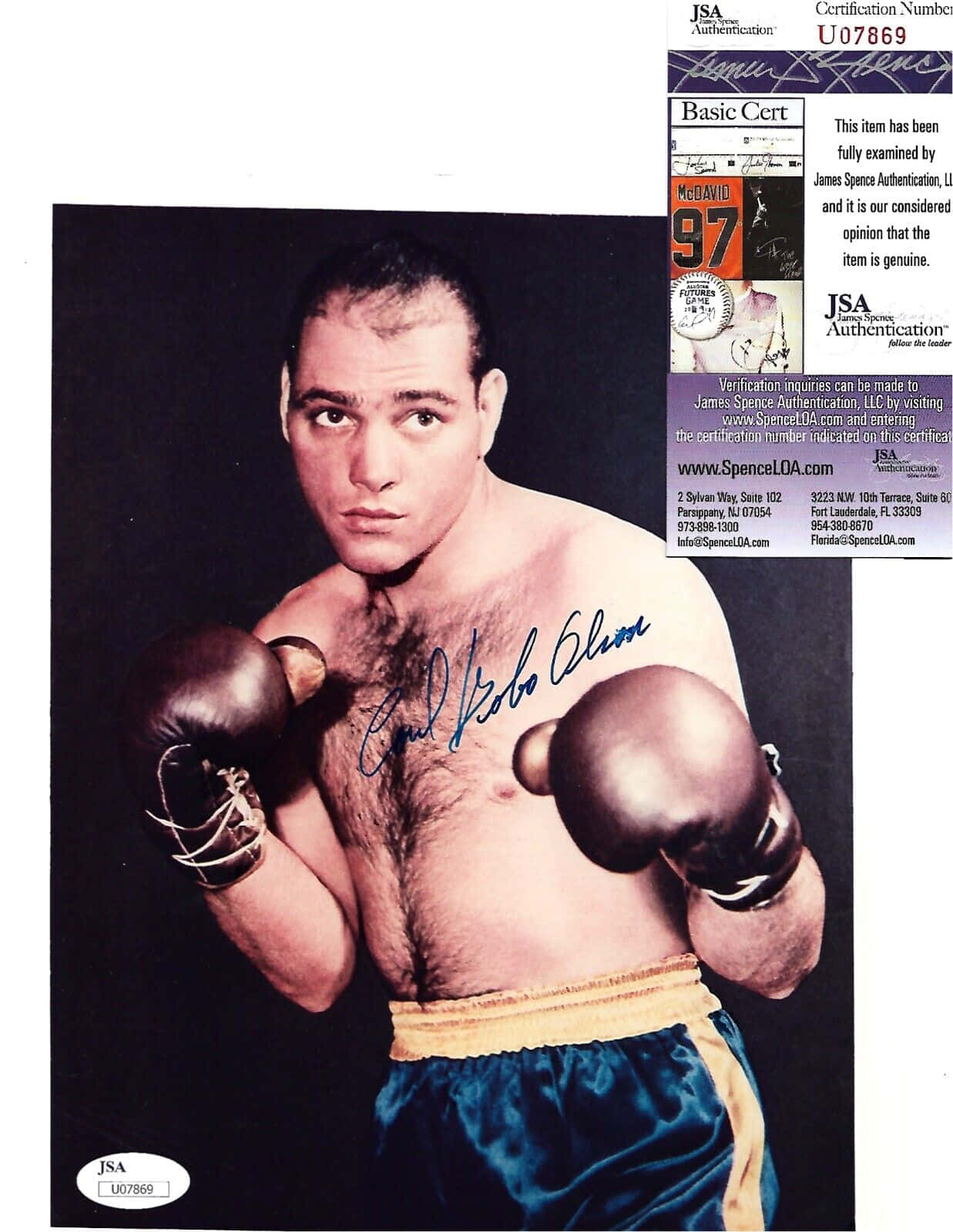 Boxing 桌布 壁紙 — 一張簽名復古照片，拳擊手埃米爾·格里菲斯在黑色背景下擺出戰鬥姿勢，附有JSA認證貼紙。