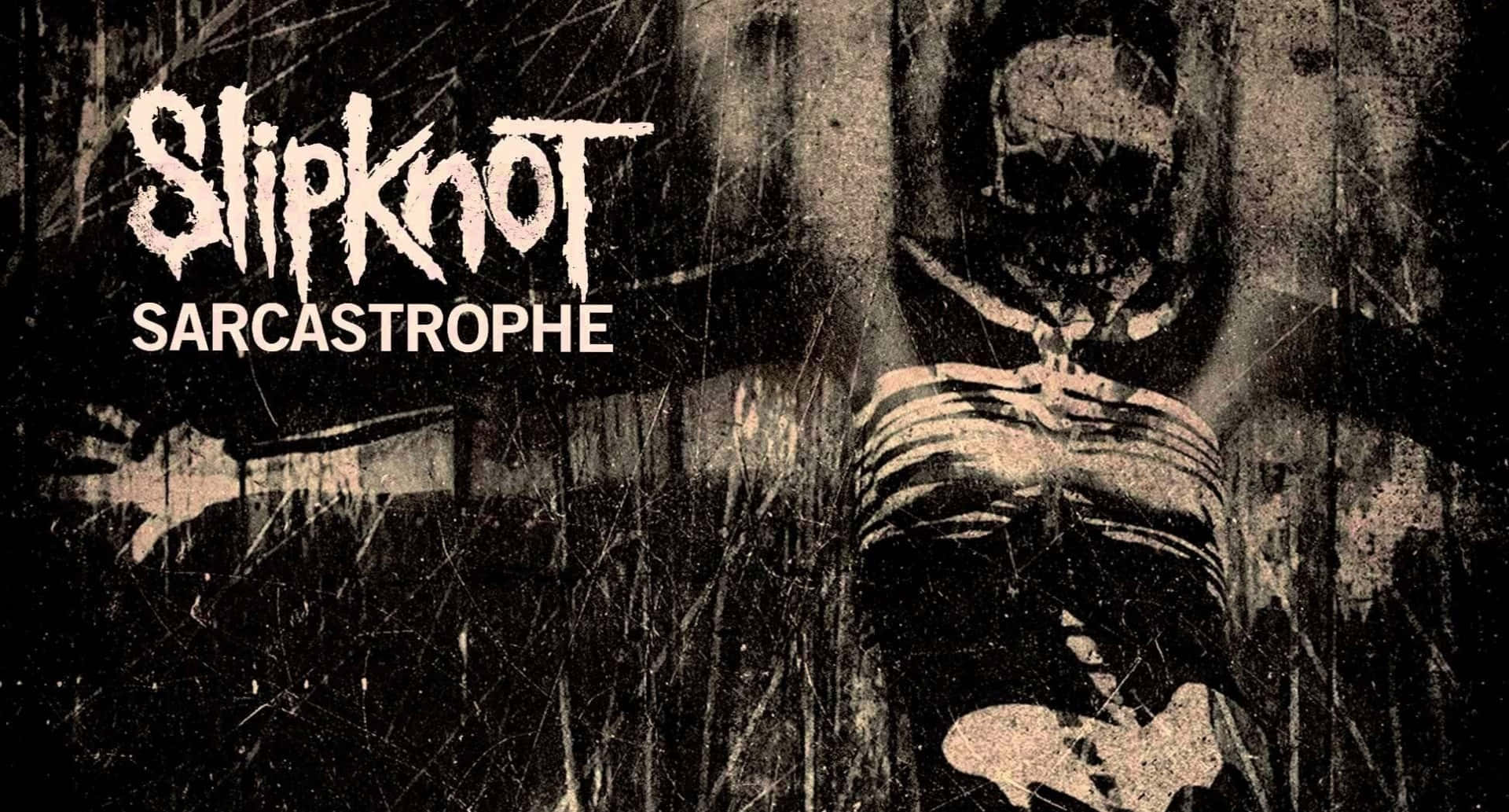 Slipknot 桌布 壁紙 — 一張粗糙的黑白專輯封面， featuring 一個戴面具、面容扭曲的人物，以及以粗體塗鴉風格字體書寫的樂隊名稱 Slipknot。