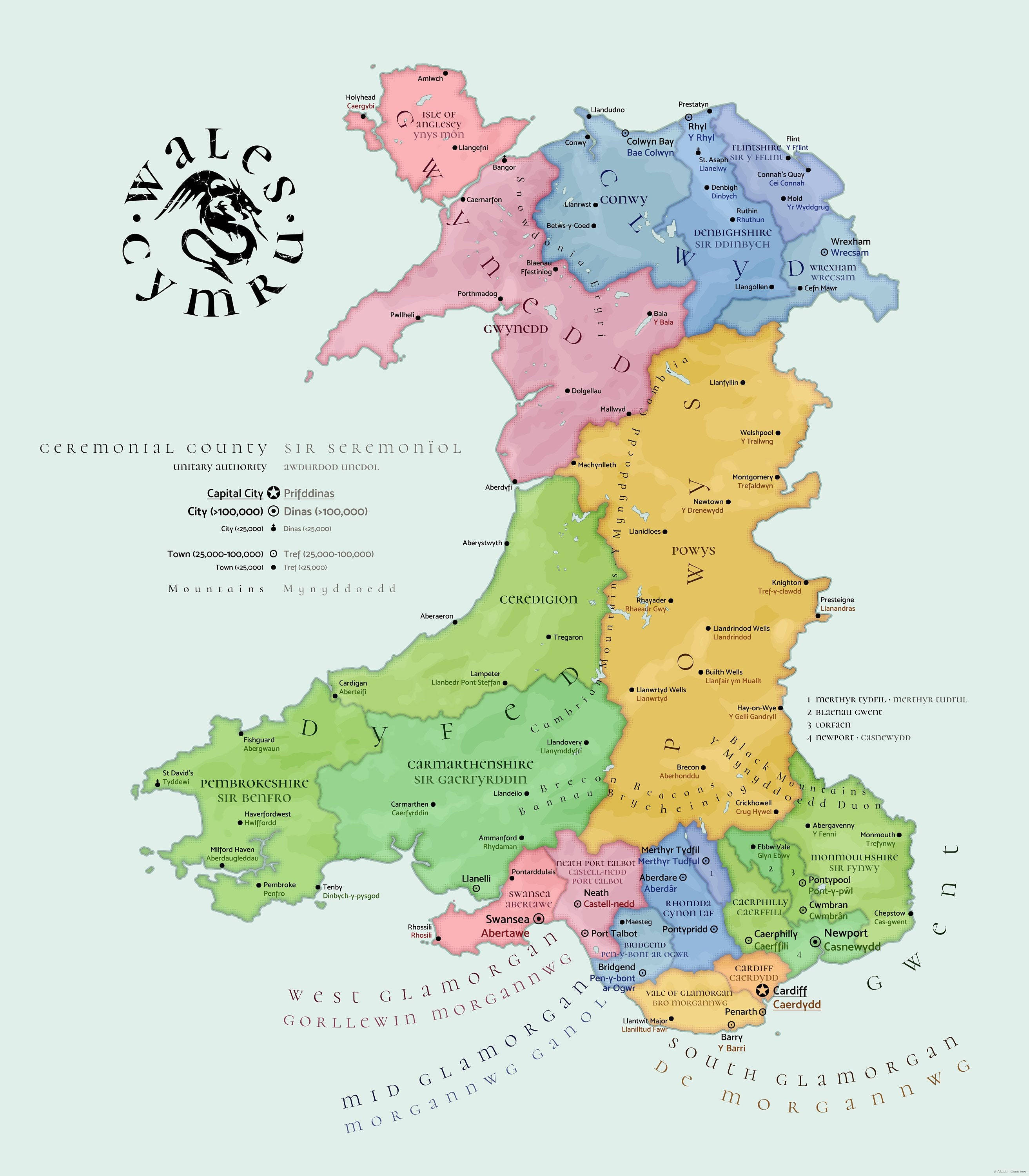 Map 桌布 壁紙 — 一張色彩繽紛的威爾斯政治地圖，在淺薄荷色背景上標有區域、城鎮和禮儀郡。
