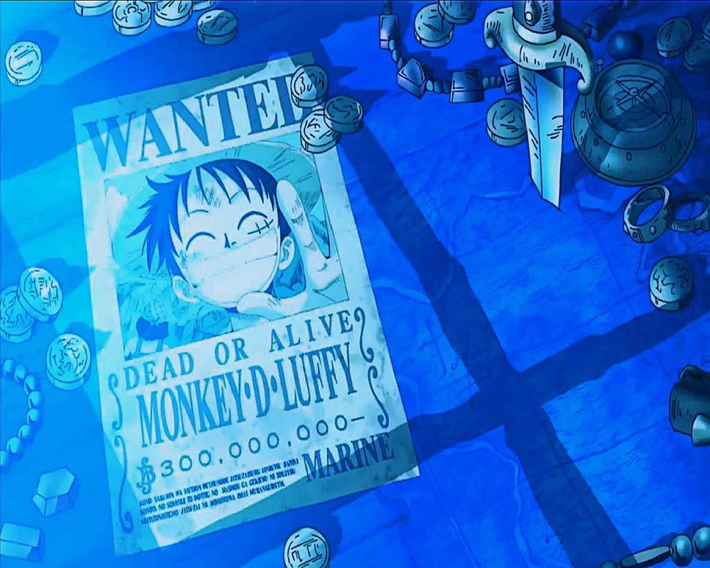 One Piece Blue 桌布 壁紙 — 一張藍色調的動畫懸賞海報，主角是蒙奇·D·魯夫，周圍散落著硬幣和海盜裝備，表面皺巴巴的。