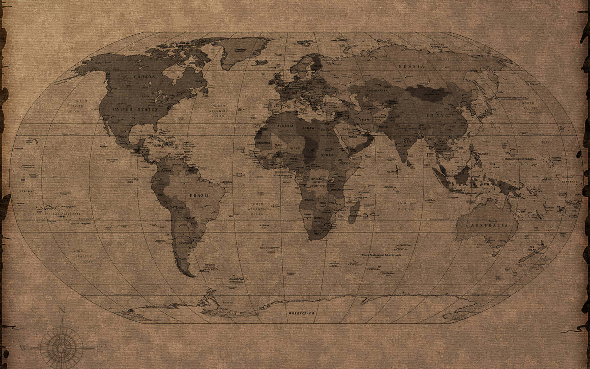 World Map Aesthetic 桌布 壁紙 — 一張陳舊的棕褐色世界地圖，邊緣破損，角落有指南玫瑰。