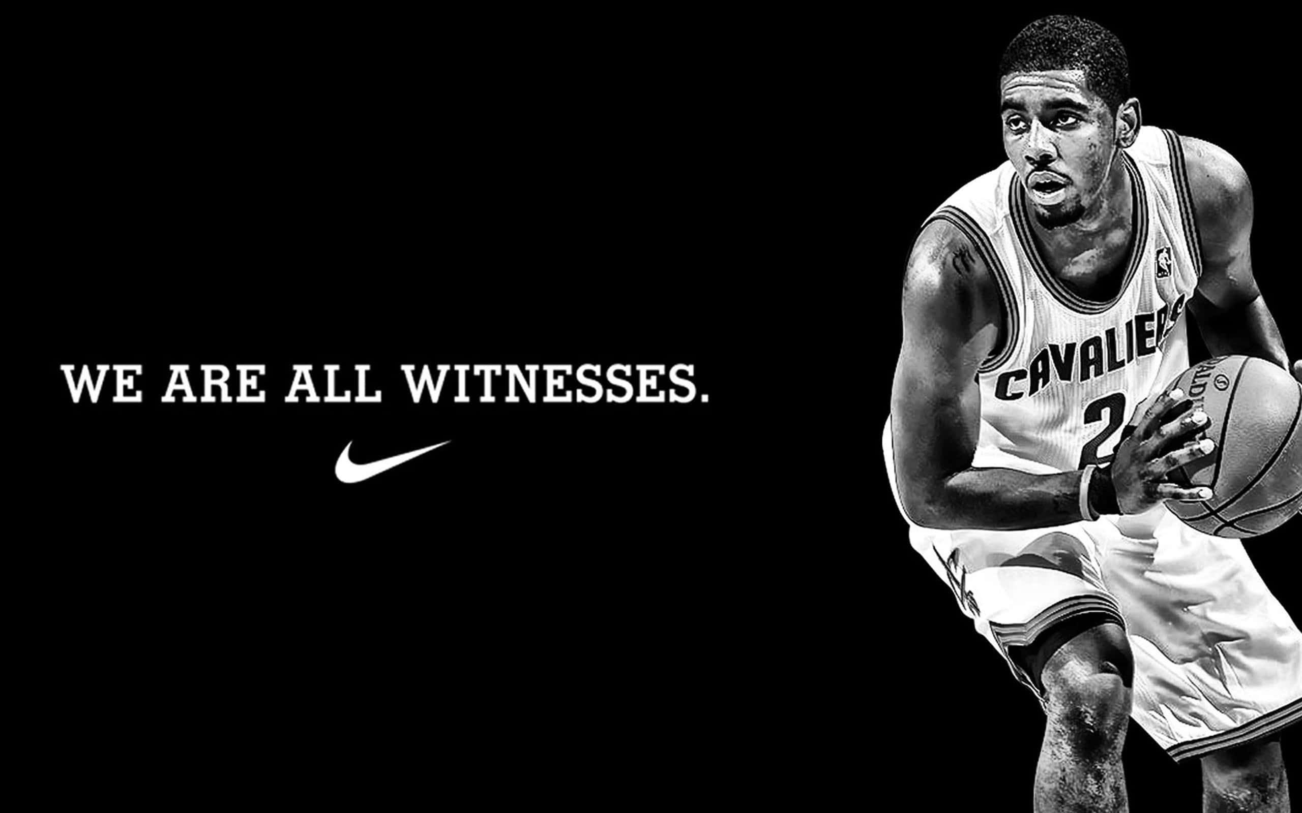 Nike 節奏籃球 桌布 壁紙 — 一張黑白照片，一名身穿騎士隊球衣的籃球運動員在深色背景下專注地運球。