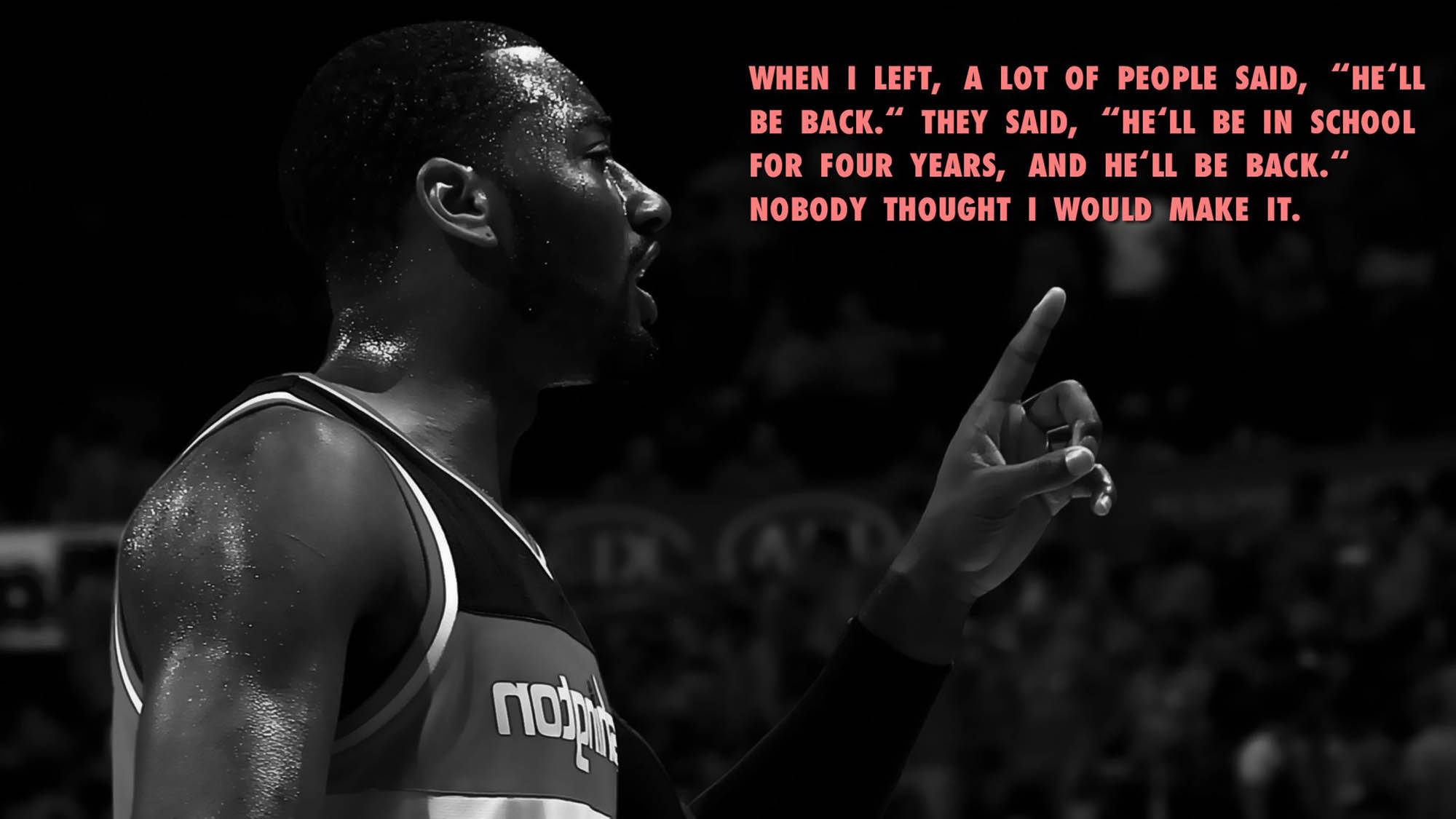 John Wall 桌布 壁紙 — 一張黑白照片中，一位堅定的籃球運動員向上指著，並帶有紅色文字疊加的勵志名言。