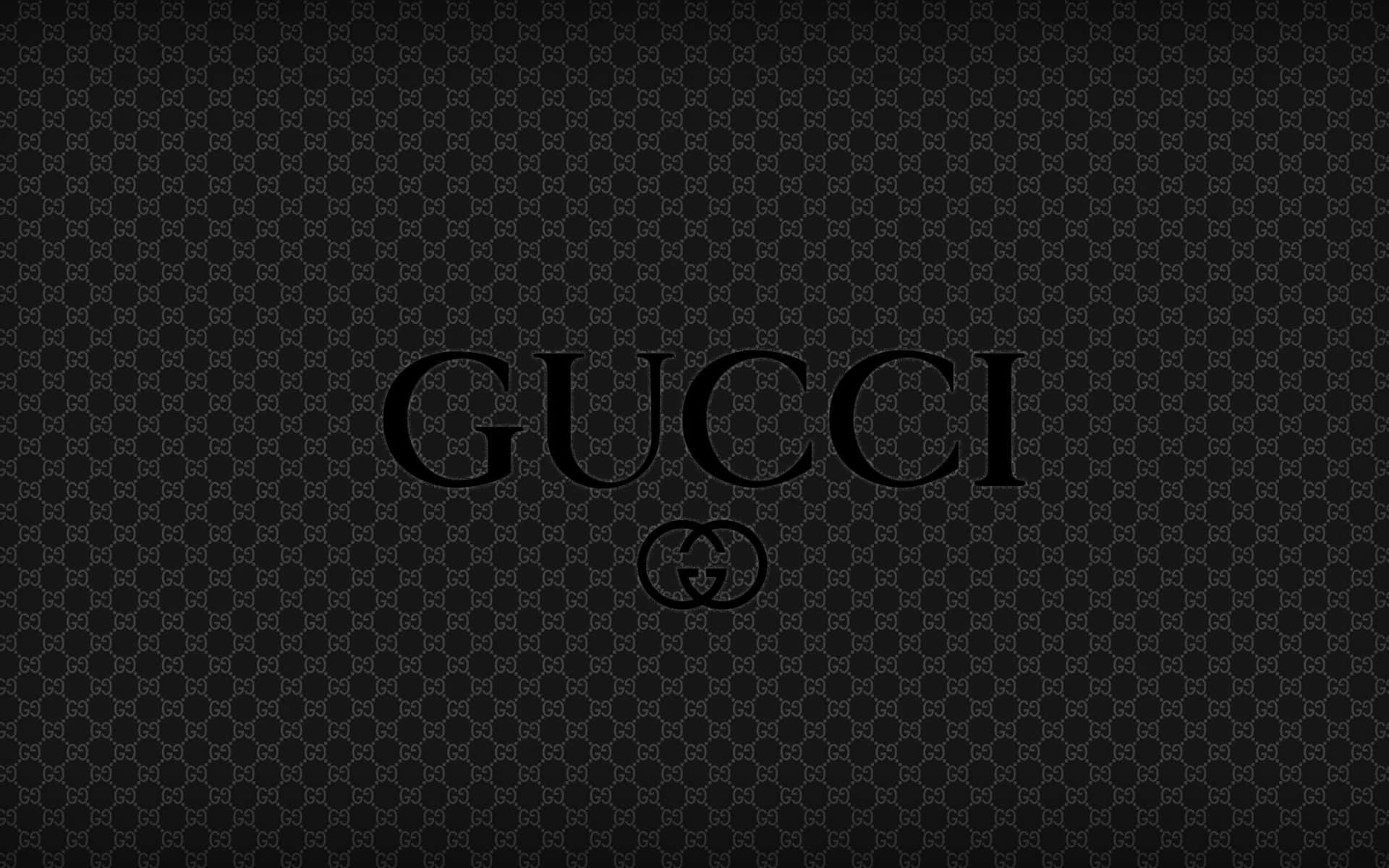 Gucci 桌布 壁紙 — 一張黑色桌布，Gucci 標誌居中，置於較深黑色的重複 GG 字母組合圖案之上。