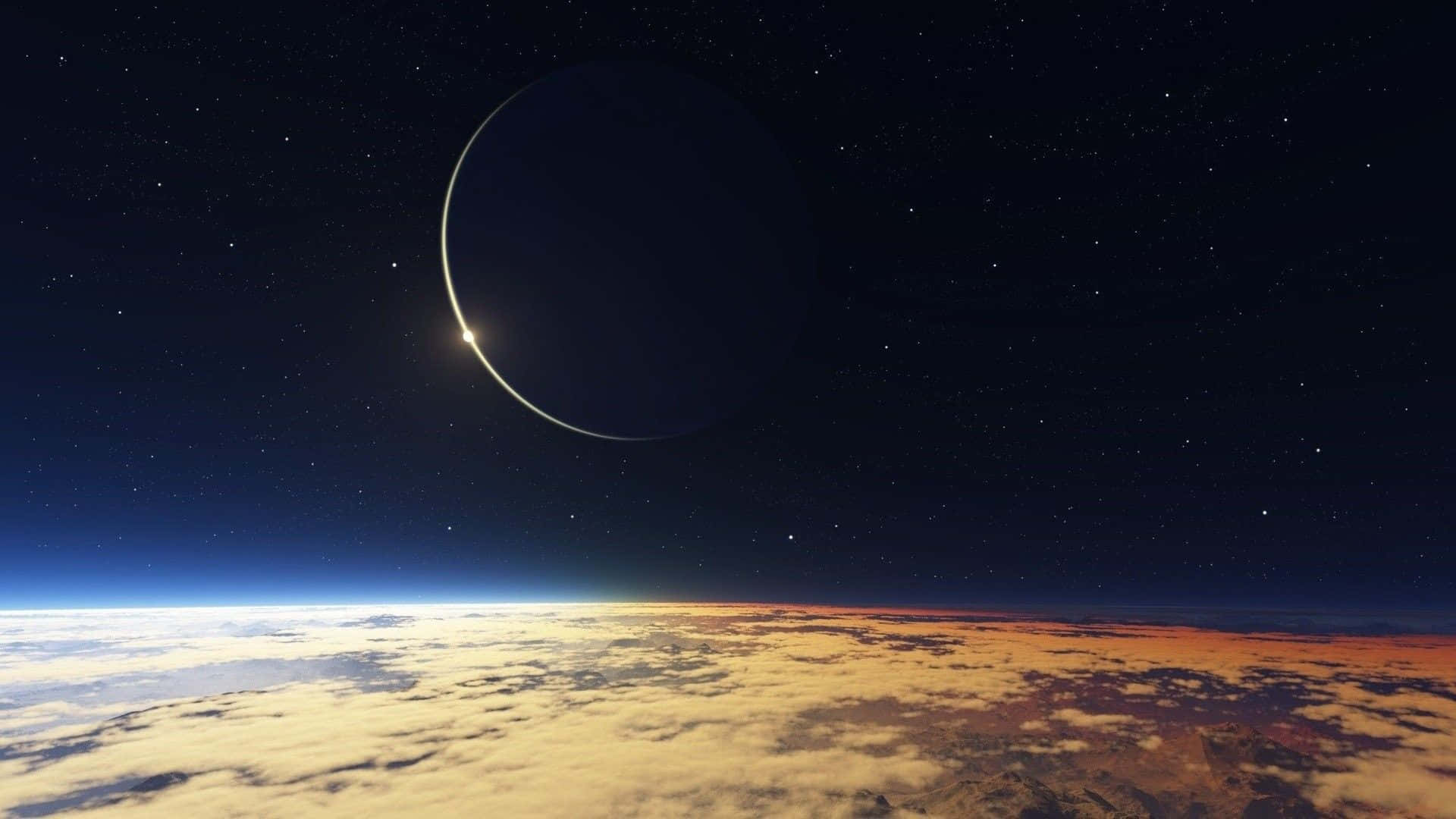 外太空 桌布 壁紙 — 一彎新月在暮色中照耀著地球雲層覆蓋的地平線之上的星空。