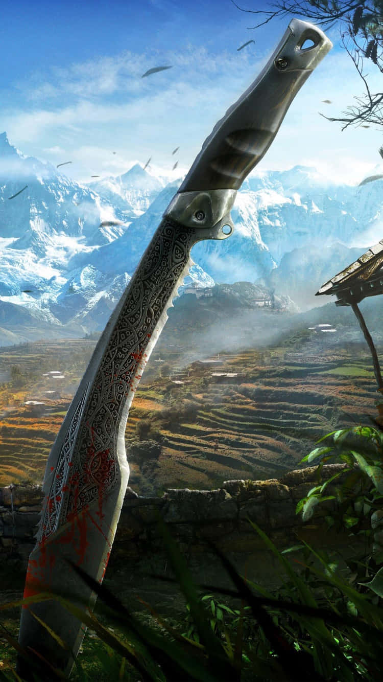 iPhone Xs Far Cry 3 桌布 壁紙 — 一把沾滿血跡的華麗刀直立於草地上，前方是山巒疊翠的梯田山谷，天空湛藍明亮。