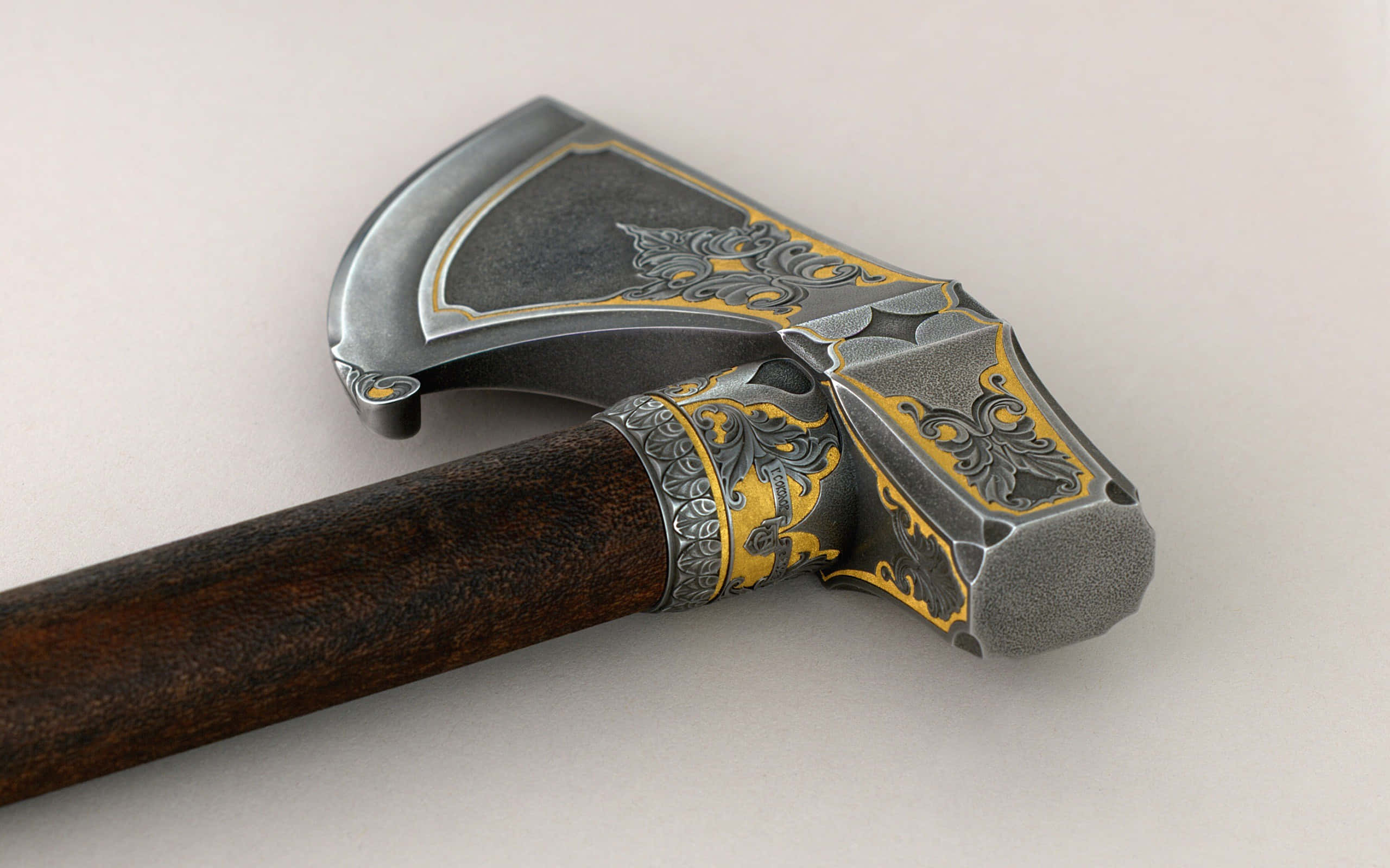 Ancient Weapons 桌布 壁紙 — 一把裝飾華麗的戰斧特寫，帶有深色木柄和精雕細琢的銀色和金色刀片，背景為純白色。