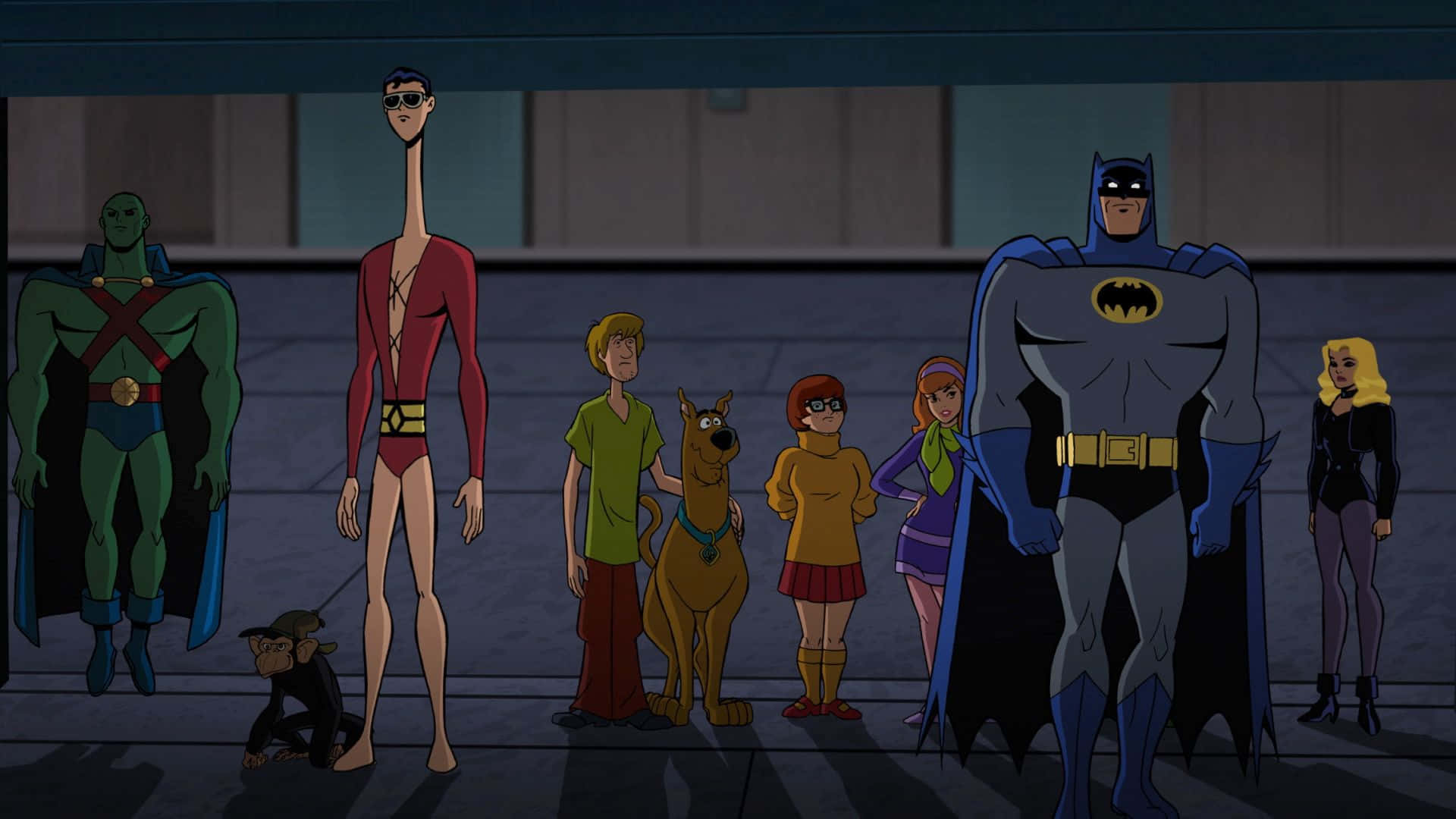 Batman The Brave And The Bold 桌布 壁紙 — 一排動畫超級英雄和史酷比角色站在燈光昏暗的城市小巷中。