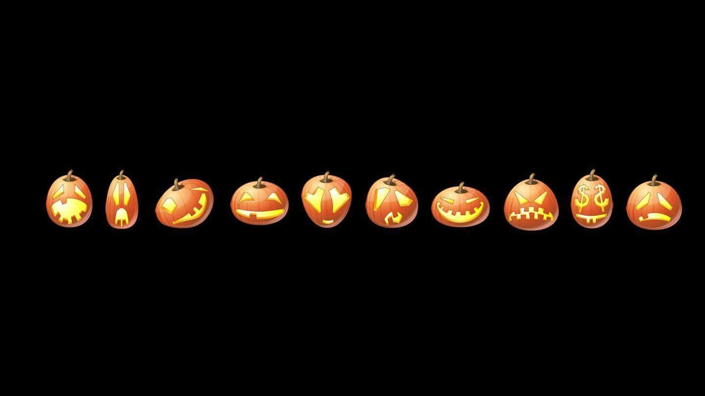 Funny Halloween 桌布 壁紙 — 一排十個發光的南瓜燈，帶有各種恐怖面孔，背景為黑色。