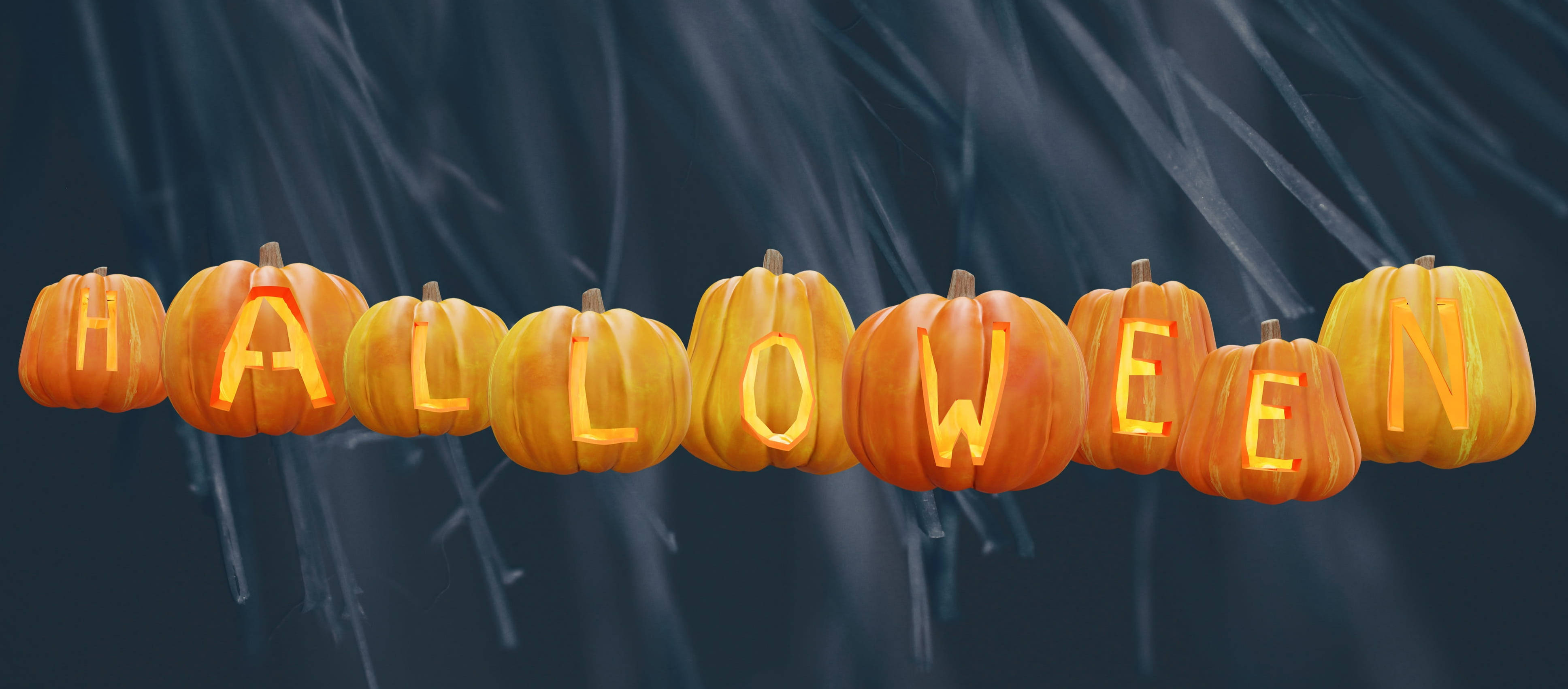 可愛萬聖節 桌布 壁紙 — 一排發光的橙色南瓜拼出halloween，背景陰暗詭異，掛滿蜘蛛網。