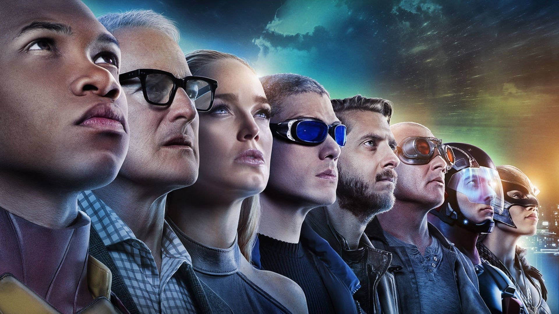 一隊身穿未來裝備的超級英雄向上望向宇宙天空。 — Caity Lotz 動圖 壁紙