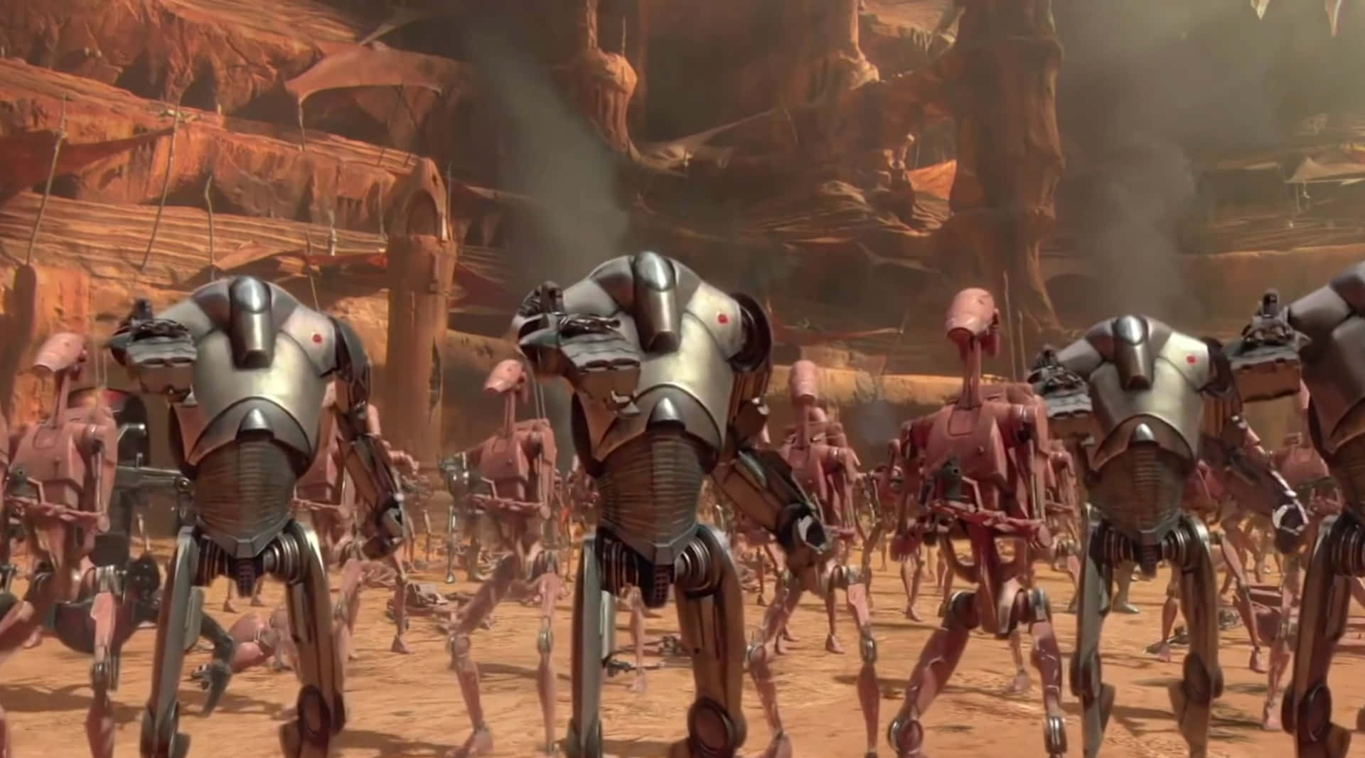 The Battle Of Geonosis 桌布 壁紙 — 一支戰鬥機器人部隊在朦朧的天空下，穿越沙漠星球上佈滿灰塵的峽谷。