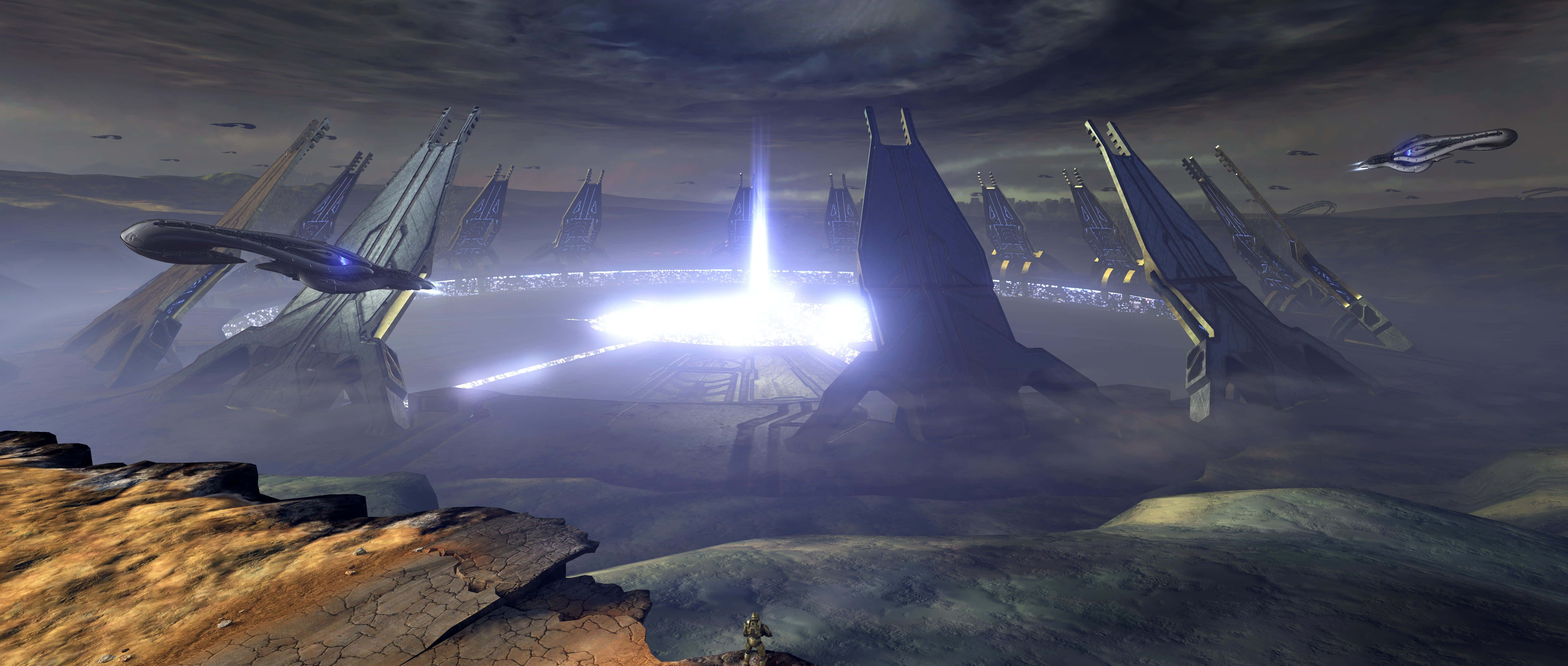 Halo Ark 桌布 壁紙 — 一支未來風格的流線型太空船艦隊在風暴天空下盤旋於荒蕪的外星景觀之上。
