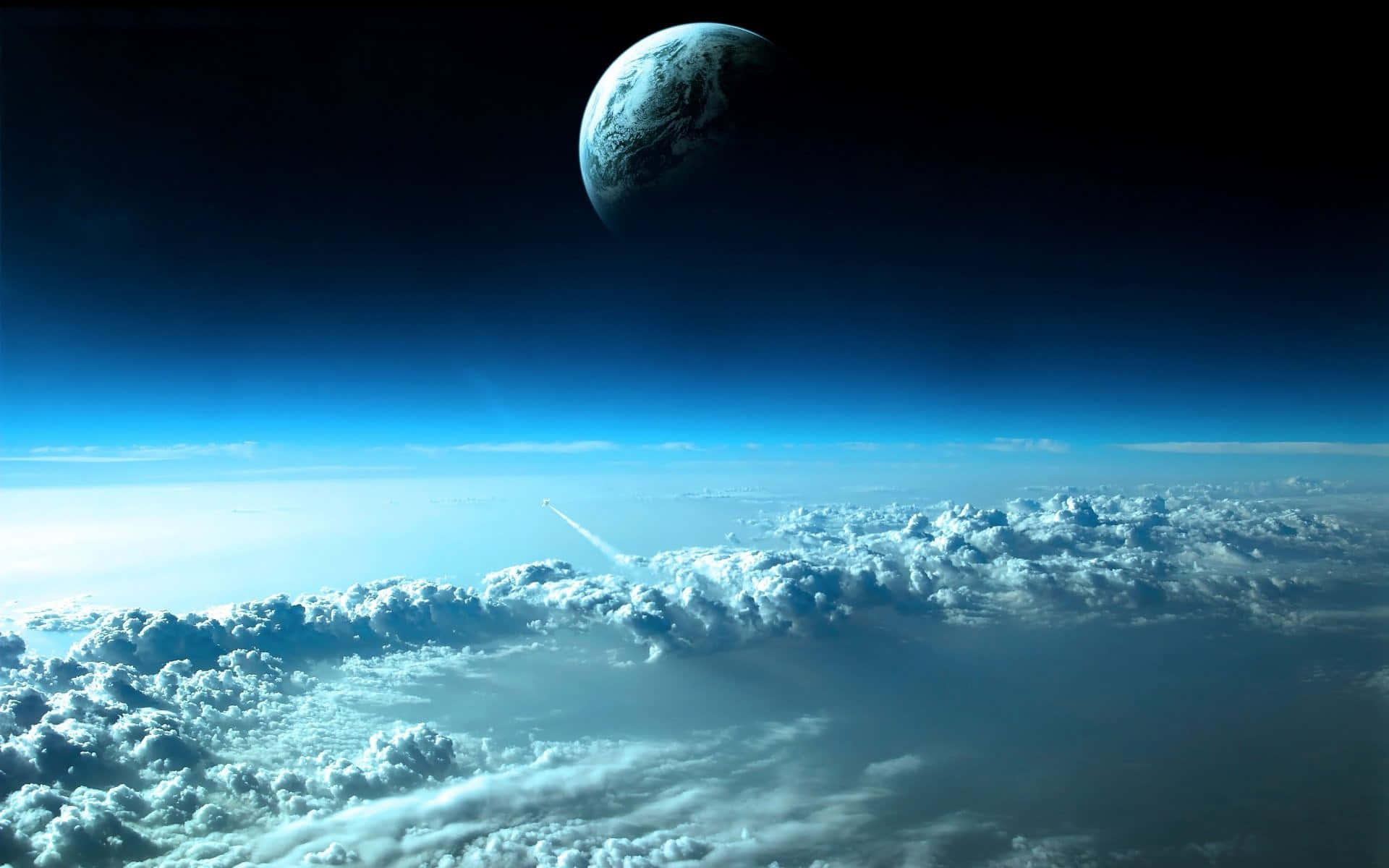 桌布 壁紙 — 一支火箭穿過蓬鬆的雲層，飛向懸掛在黑暗宇宙中的遙遠藍色星球。