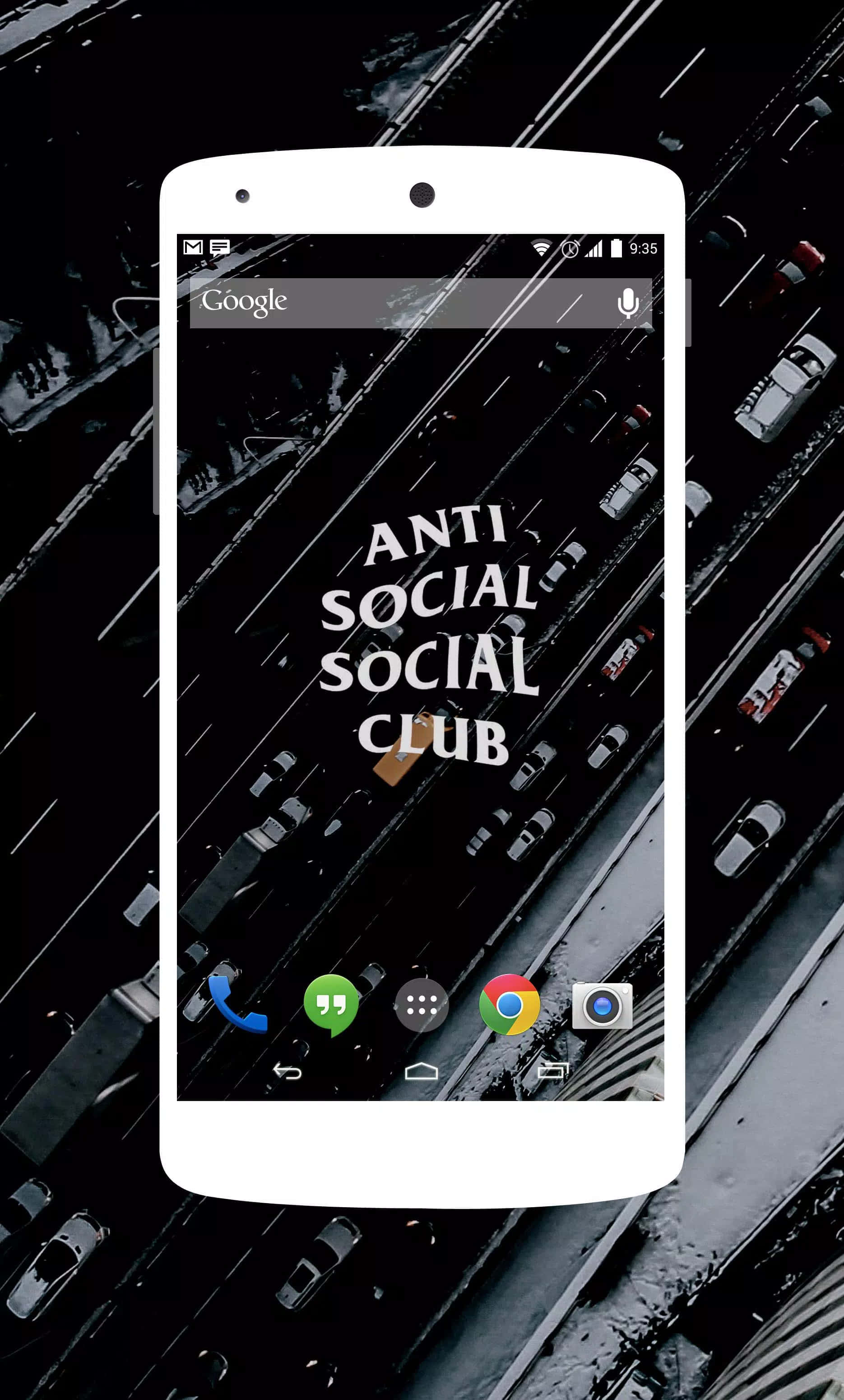 Anti Social Club iPhone 桌布 壁紙 — 一支白色智慧型手機在繁忙高速公路的黑白空拍圖上顯示「Anti Social Social Club」桌布。
