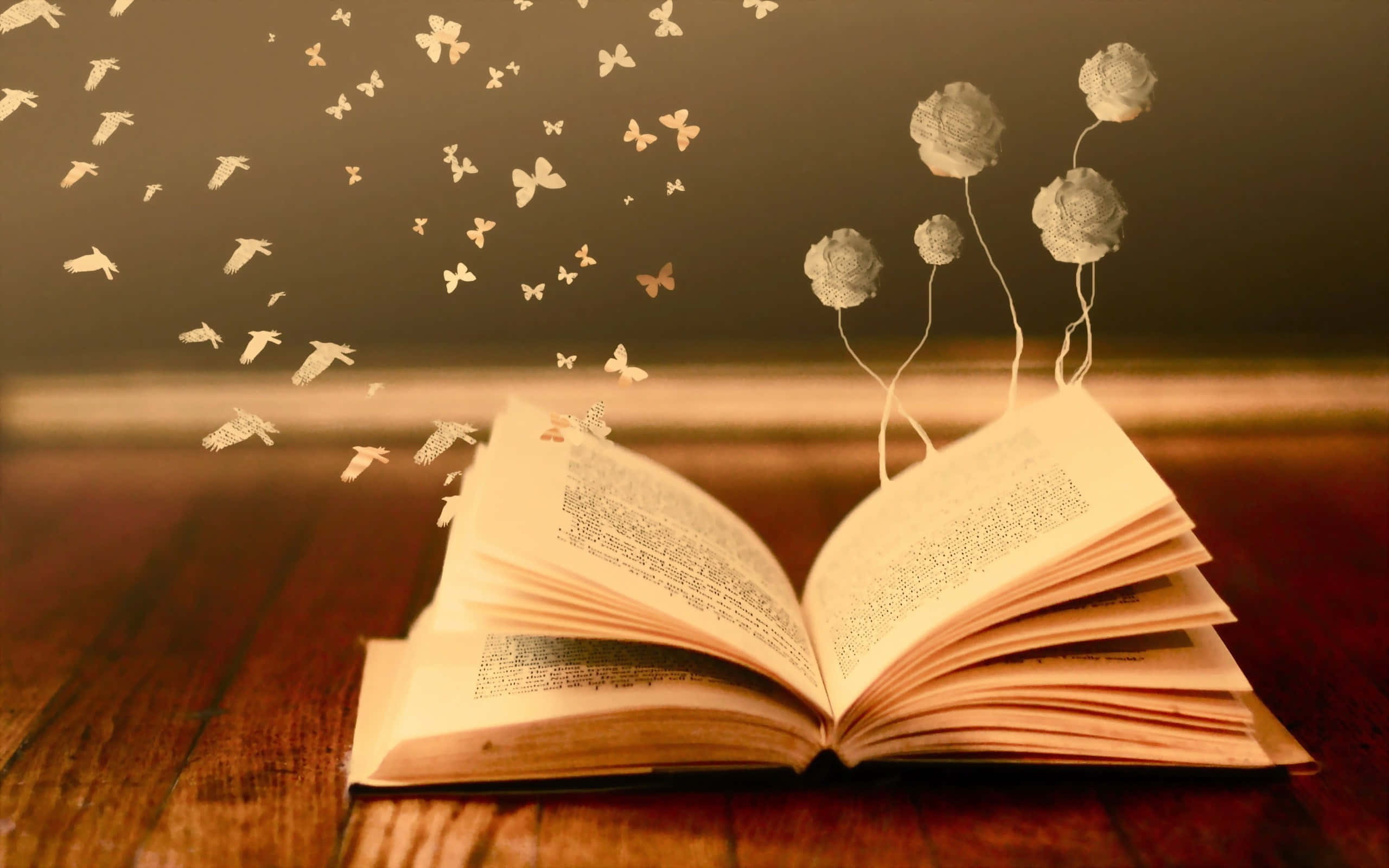 一本打開的書，蝴蝶從中飛出 壁紙