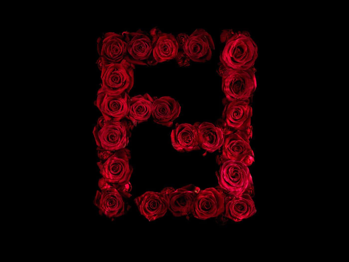 紅玫瑰排列成字母E形狀在黑色背景上。 — Valorant Logo 壁紙