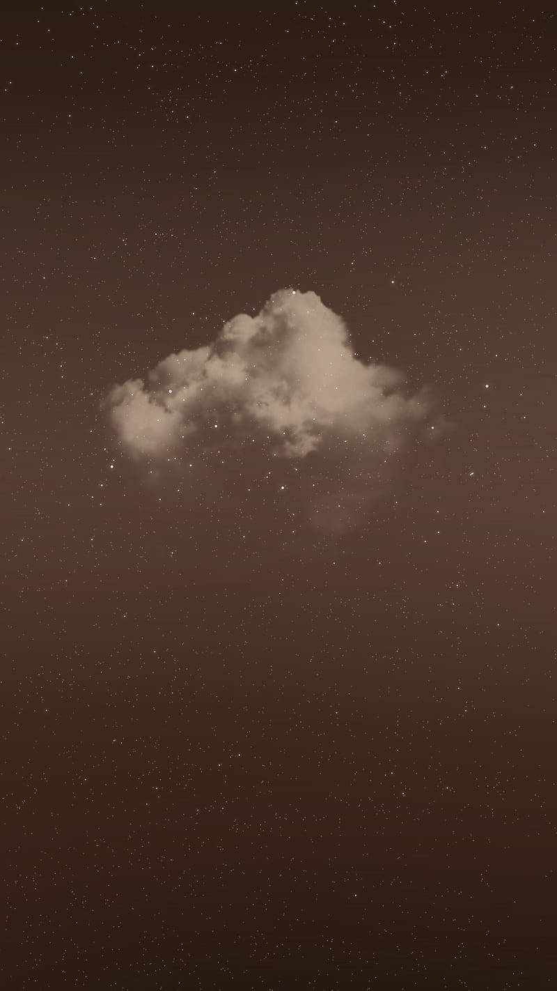 雲朵 桌布 壁紙 — 一朵孤雲在溫暖的深褐色調的星空夜空中飄移。