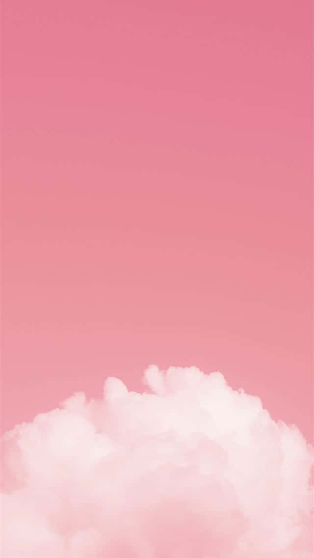 Light Pink iPhone 桌布 壁紙 — 一朵柔軟蓬鬆的雲朵停留在底部，映襯著漸變粉紅色的天空。