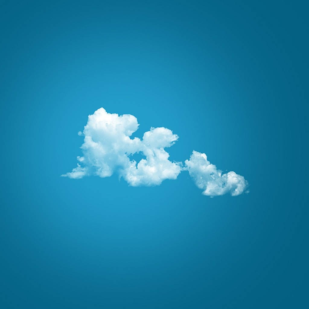 Cloud 桌布 壁紙 — 一朵蓬鬆的白雲在漸變的藍天中飄移，柔軟而寧靜。