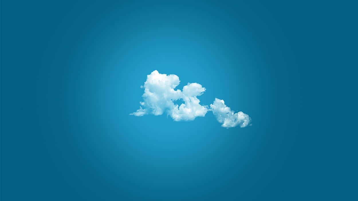 雲朵 桌布 壁紙 — 一朵蓬鬆的白雲獨自漂浮在漸層的藍天上。