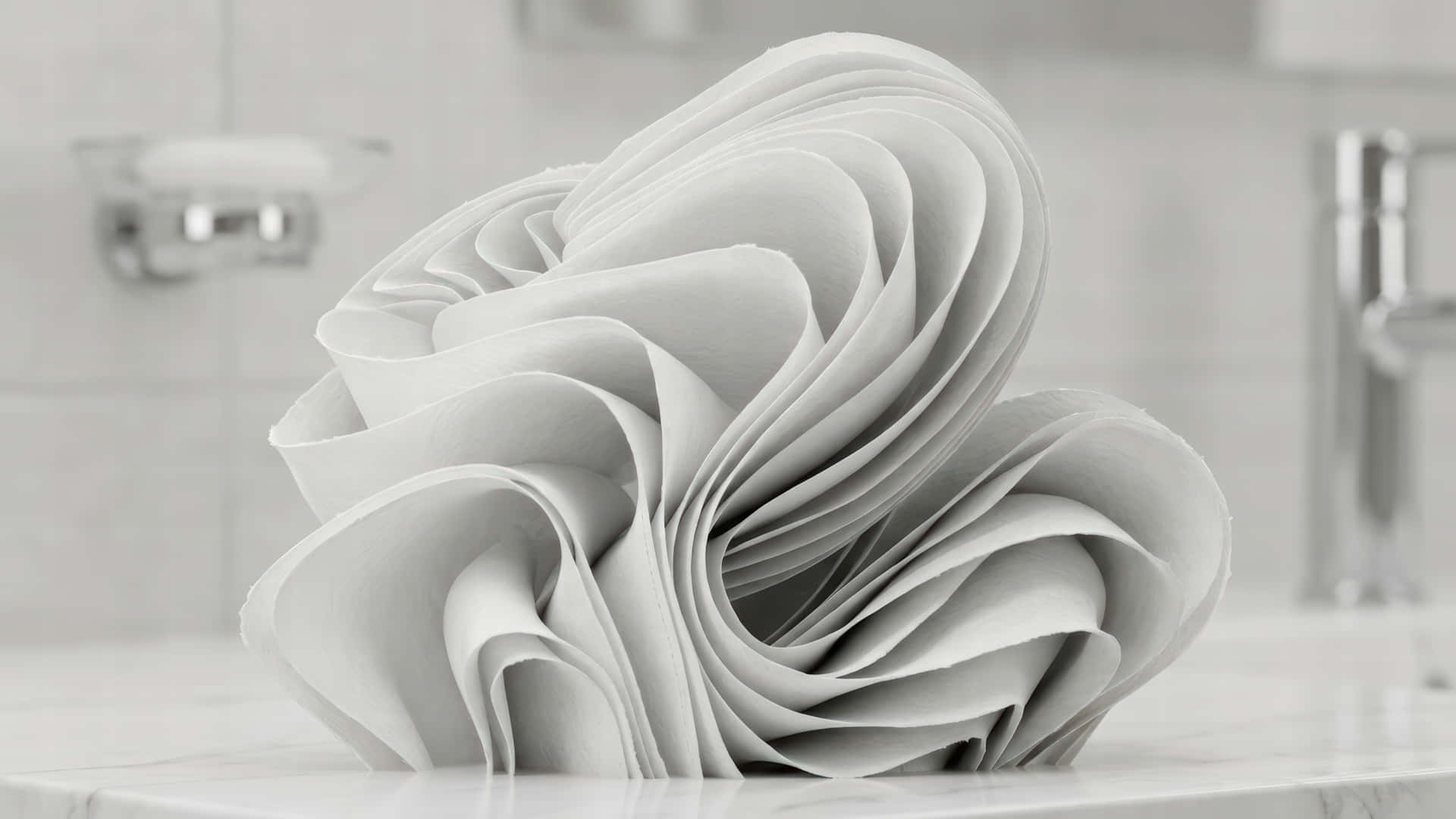 Toilet paper Bloom modded wallpaper for desktop Enhancement, 壁紙 — 一朵雕刻的白色紙玫瑰，帶有層層花瓣，放在大理石浴室檯面上，旁邊是鍍鉻裝置。