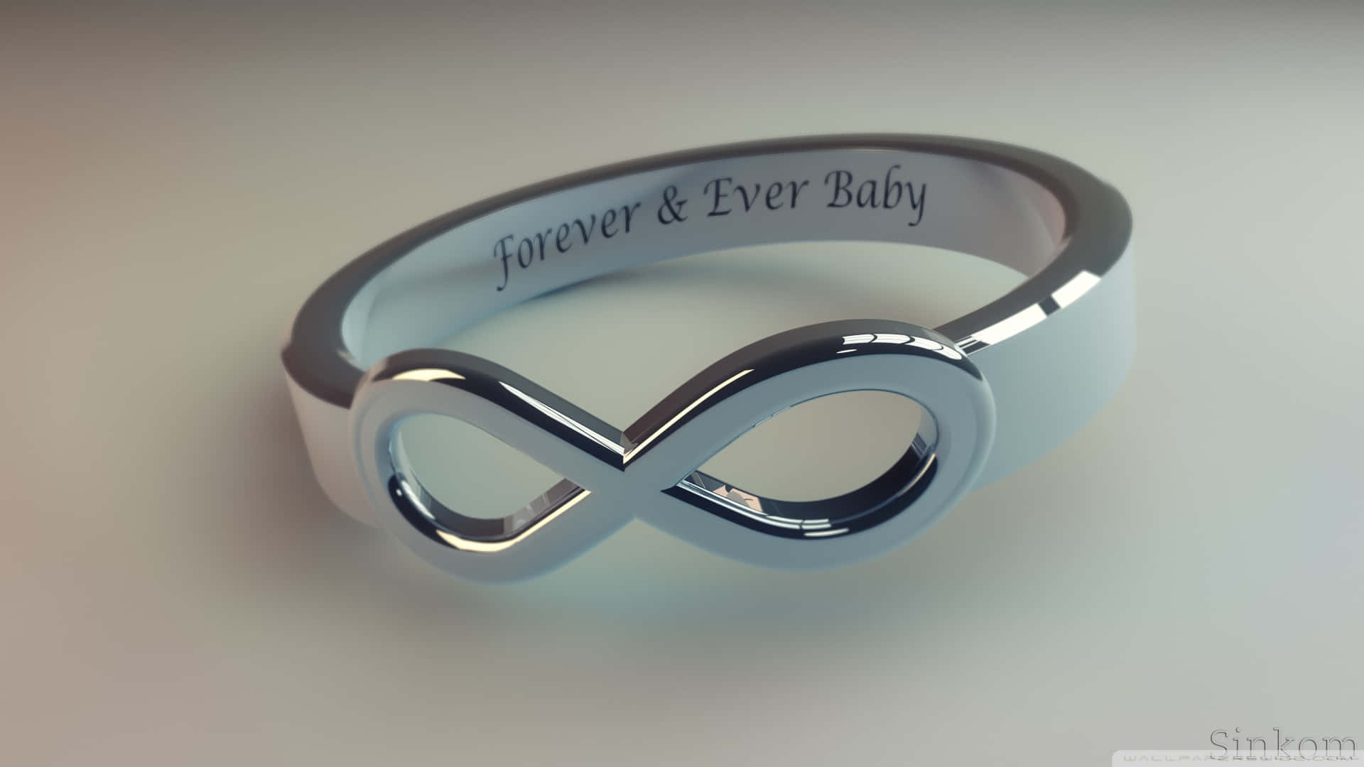 桌布 壁紙 — 一枚刻有 forever and ever baby 的時尚銀色無限戒指，放置在柔和的漸變背景上。
