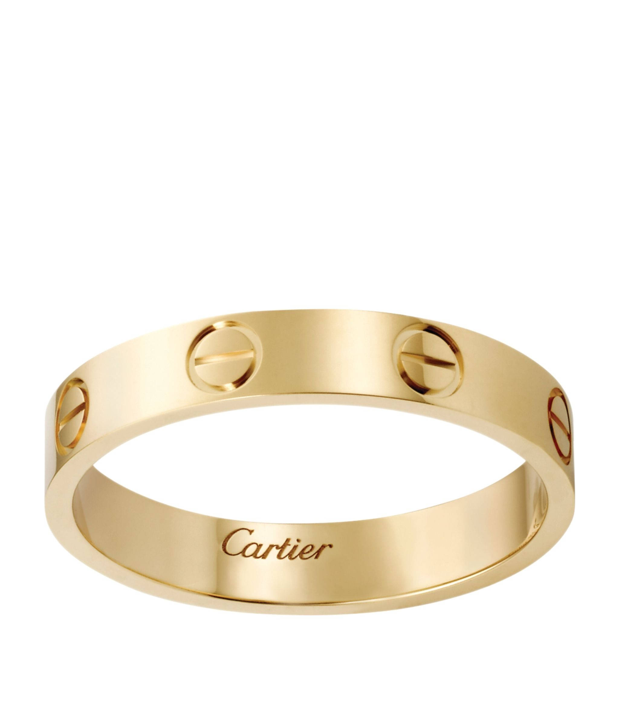 手錶 桌布 壁紙 — 一枚時尚的黃金Cartier love戒指，帶有標誌性的螺絲圖案和刻印品牌名稱，背景為純白色。