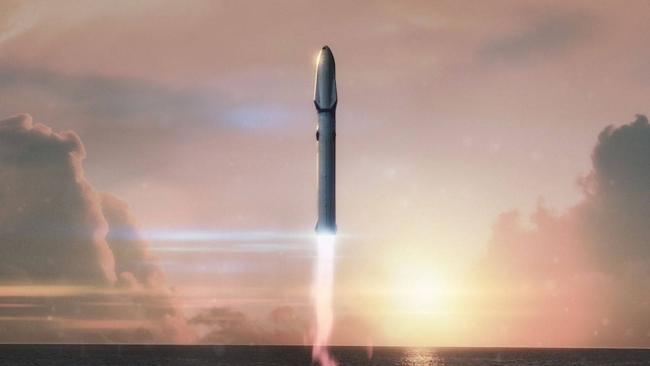 SpaceX 桌布 壁紙 — 一枚流線型火箭在日落時垂直升上海洋上空，在粉彩雲層中留下火紅的軌跡。