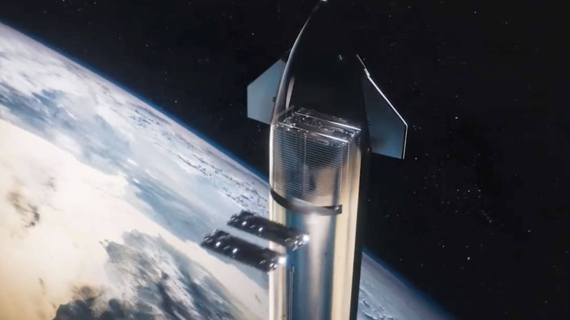高清 桌布 壁紙 — 一枚流線型的銀色 Starship 火箭在星空黑色天空和下方旋轉雲層的背景下繞地球運行。