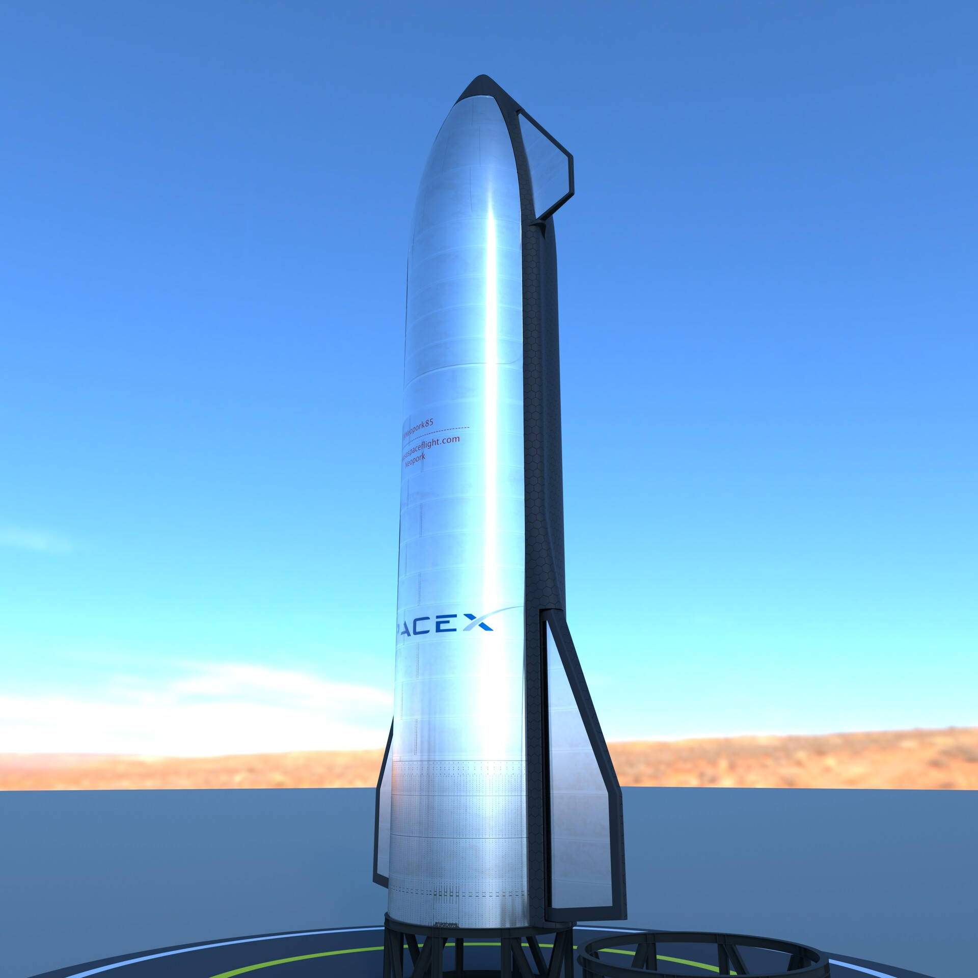 高清 桌布 壁紙 — 一枚流線型的銀色SpaceX Starship火箭高聳在發射台上，背景是清澈的藍天和沙漠地平線。
