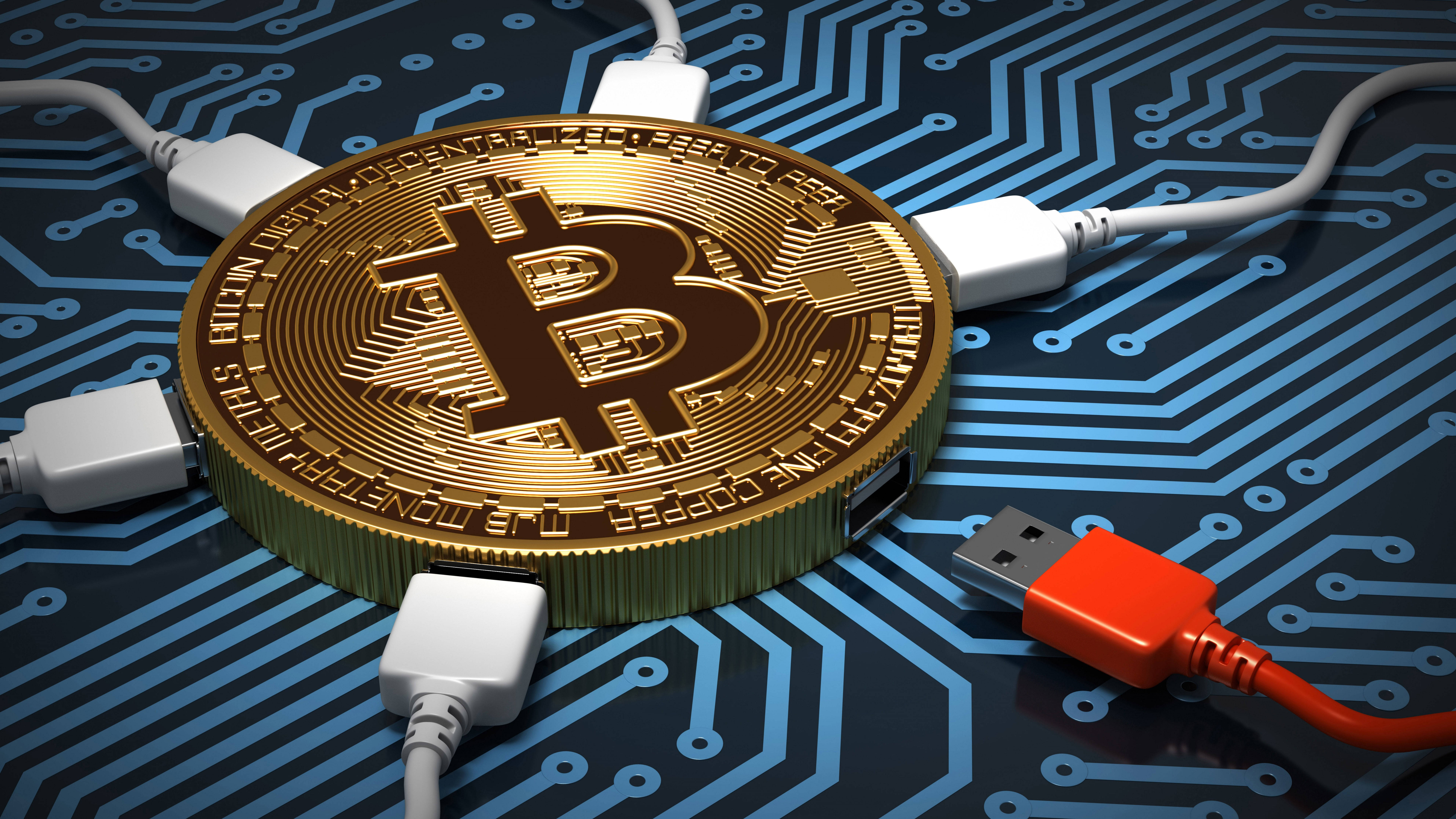 Cryptocurrency 桌布 壁紙 — 一枚金色比特幣硬幣放在藍色電路板中央，周圍有白色和一條紅色USB線。