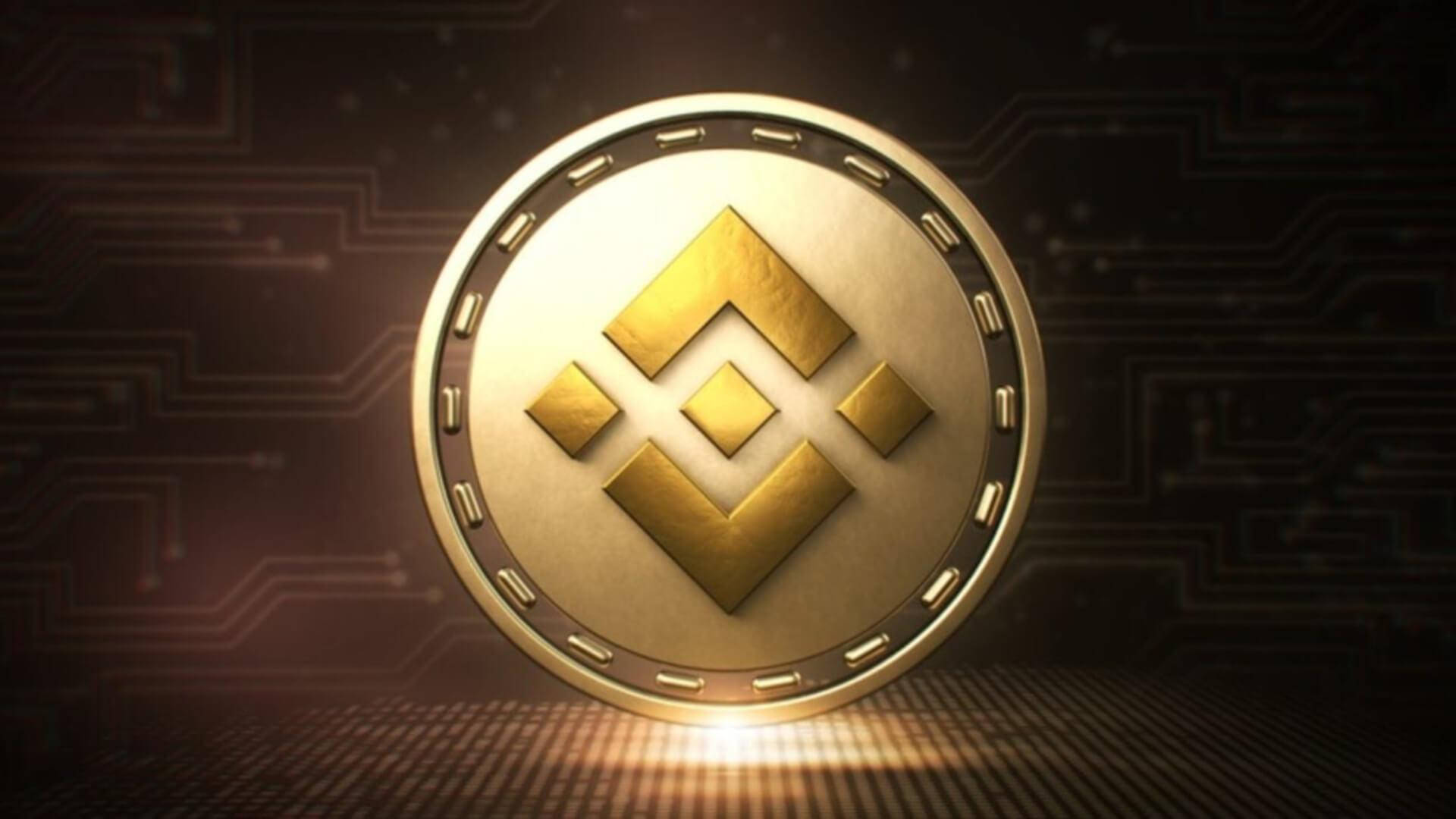 Binance 桌布 壁紙 — 一枚閃閃發光的金色Binance硬幣放在電路板表面上，背景有發光的數位線條。