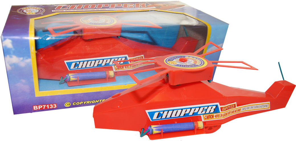 Chopper 桌布 壁紙 — 一架亮紅色玩具直升機放在其色彩繽紛、標有「CHOPPER」的盒子前面，背景為黑色。