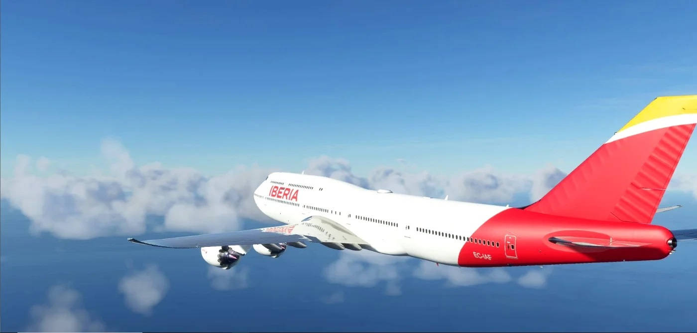 Blue Sky 桌布 壁紙 — 一架伊比利亞航空的空中巴士A380在晴朗的藍天下，優雅地翱翔於蓬鬆的白雲之上。