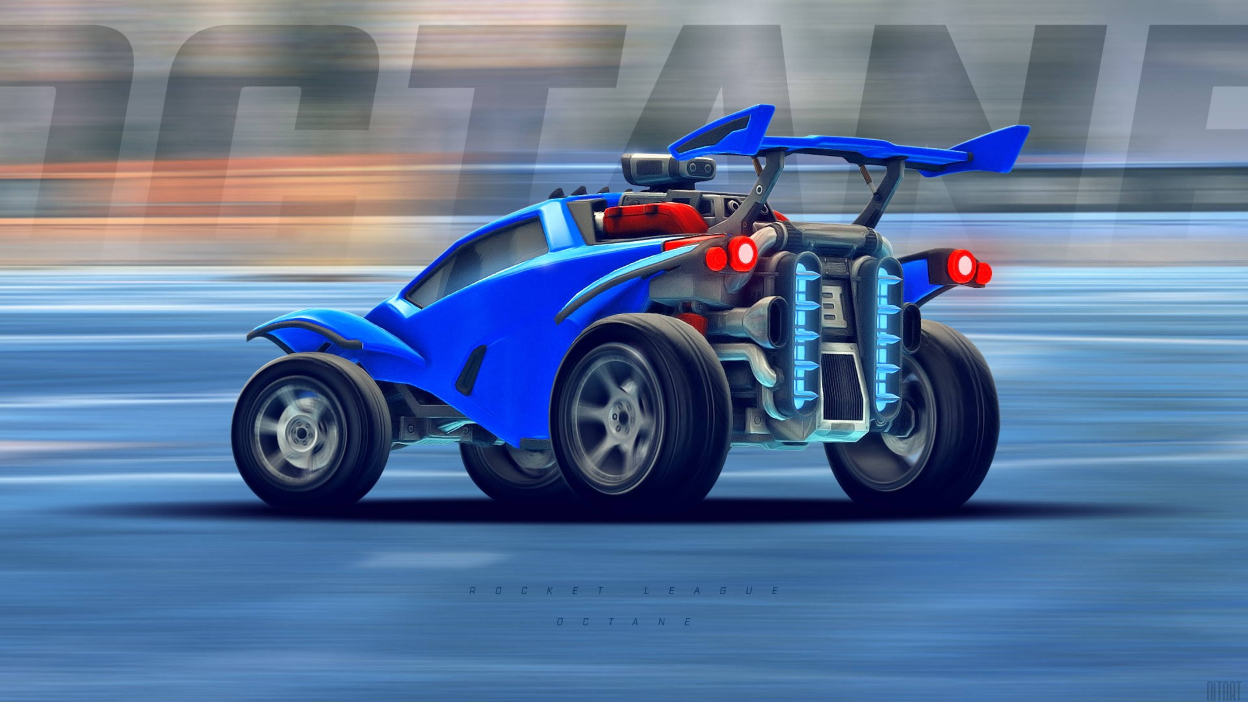 遊戲 桌布 壁紙 — 一架充滿活力的藍色Rocket League Octane汽車在模糊的賽道上疾馳，帶有發光的排氣管和運動軌跡。