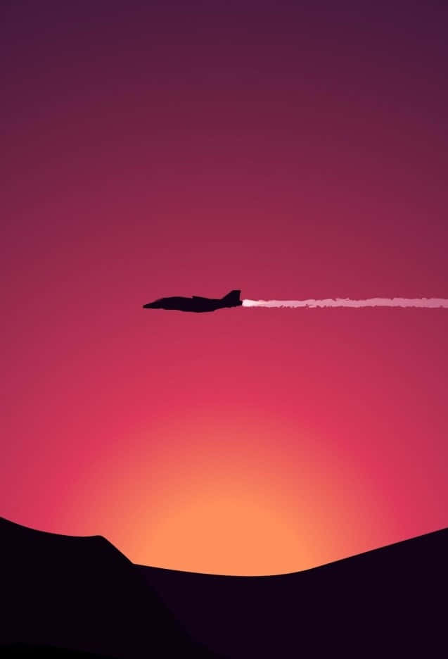 Android Jumbo Jets 桌布 壁紙 — 一架噴射機在充滿活力的日落天空中劃過，在黑暗的山脈輪廓上留下一道白色痕跡。