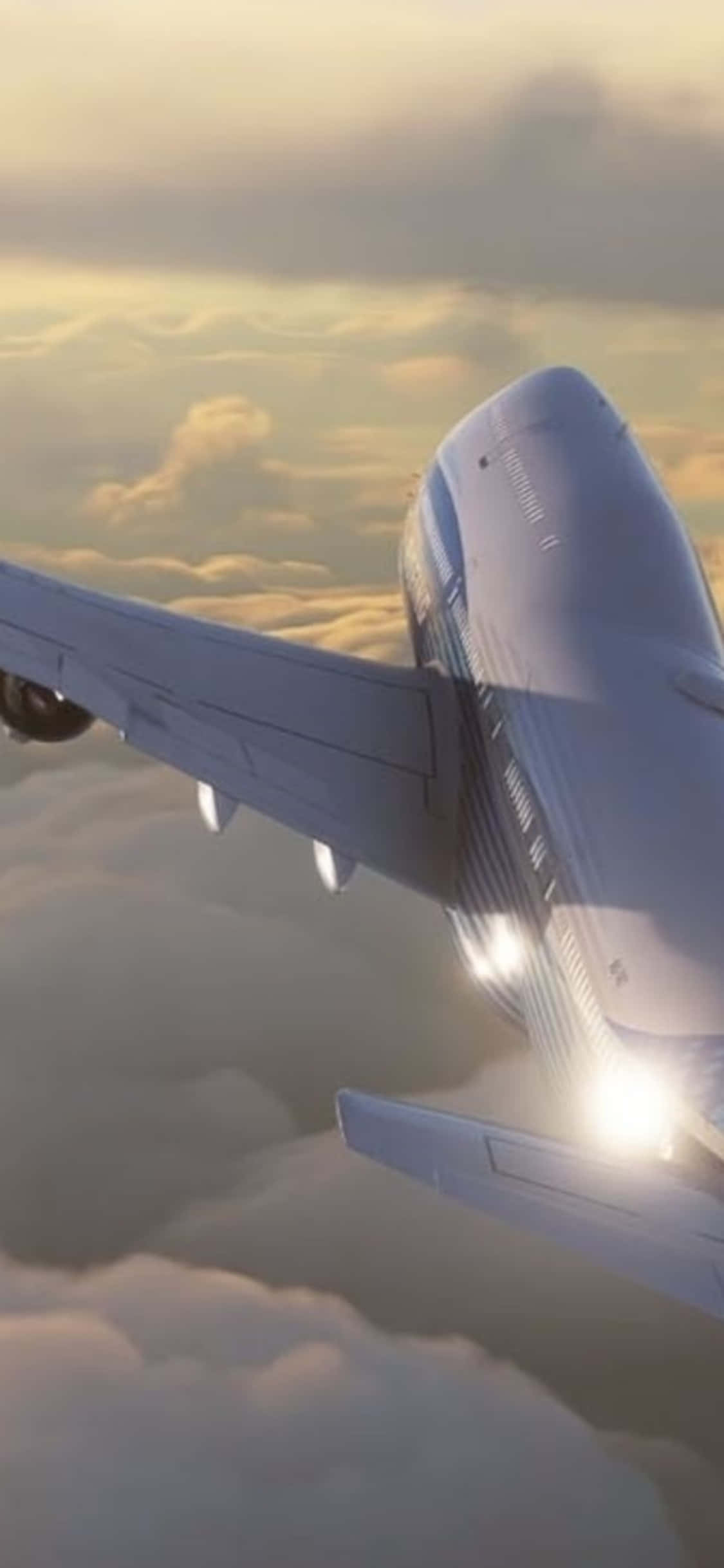 iPhone Xs Microsoft Flight Simulator 桌布 壁紙 — 一架大型飛機在沐浴在金色日落光芒中的蓬鬆雲層上方翱翔，引擎燈閃爍發光。