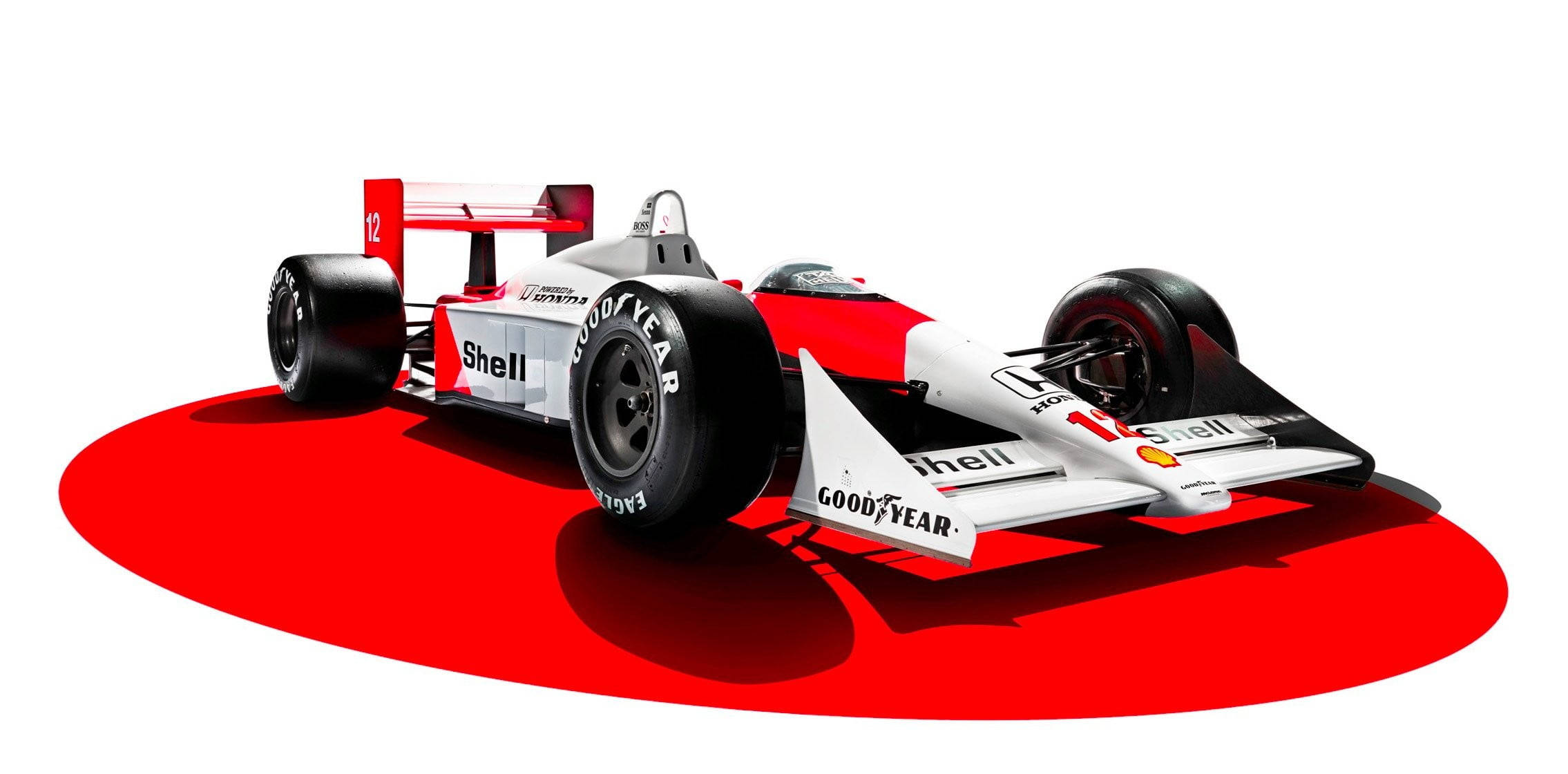 F1 桌布 壁紙 — 一架帶有Shell和Goodyear品牌的時尚紅白復古一級方程式賽車，放置在一個大膽的紅色圓形平台上，背景為純白色。