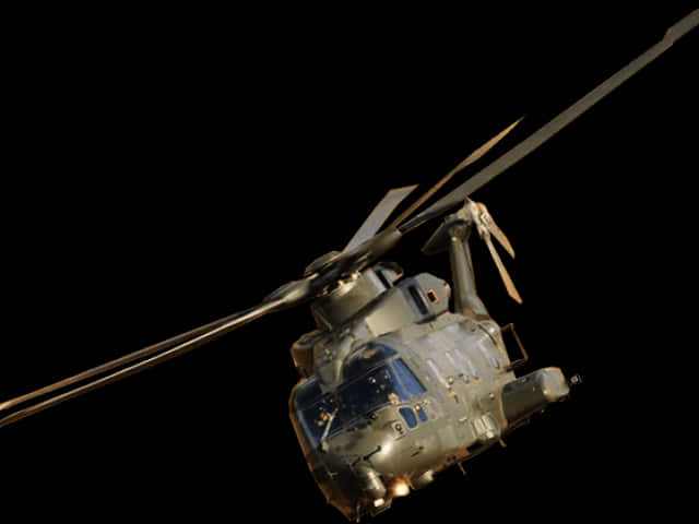 Aircraft 桌布 壁紙 — 一架帶有旋轉葉片的軍用直升機在純黑色背景下被捕捉到飛行中的瞬間。