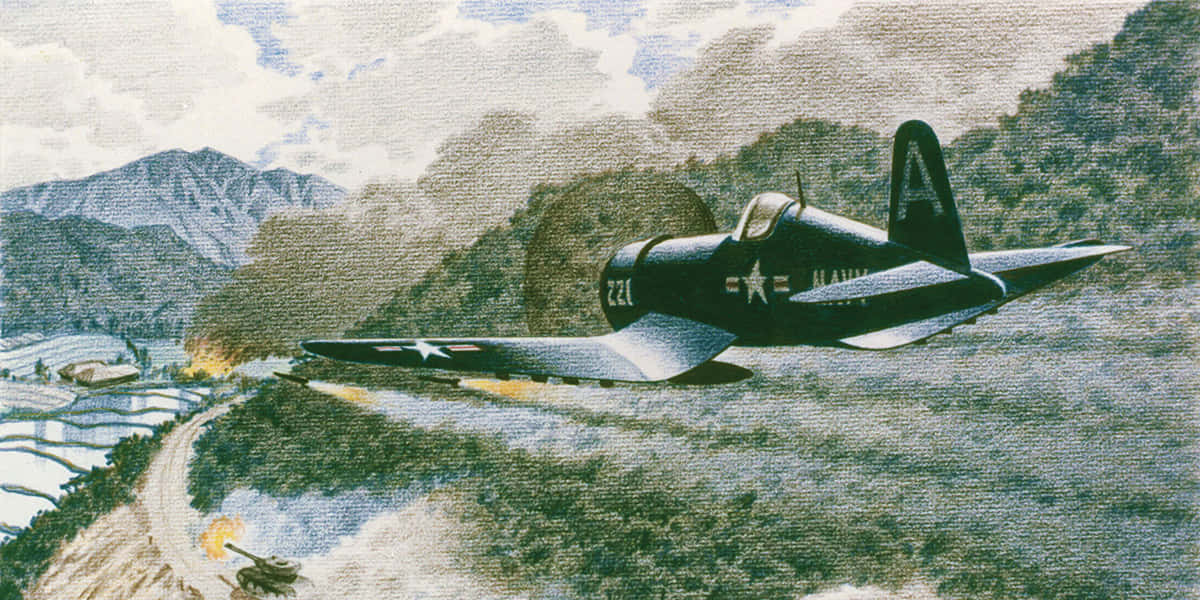 海盜船 桌布 壁紙 — 一架復古海軍戰鬥機低空飛過有梯田和遠處村莊的山區地形。