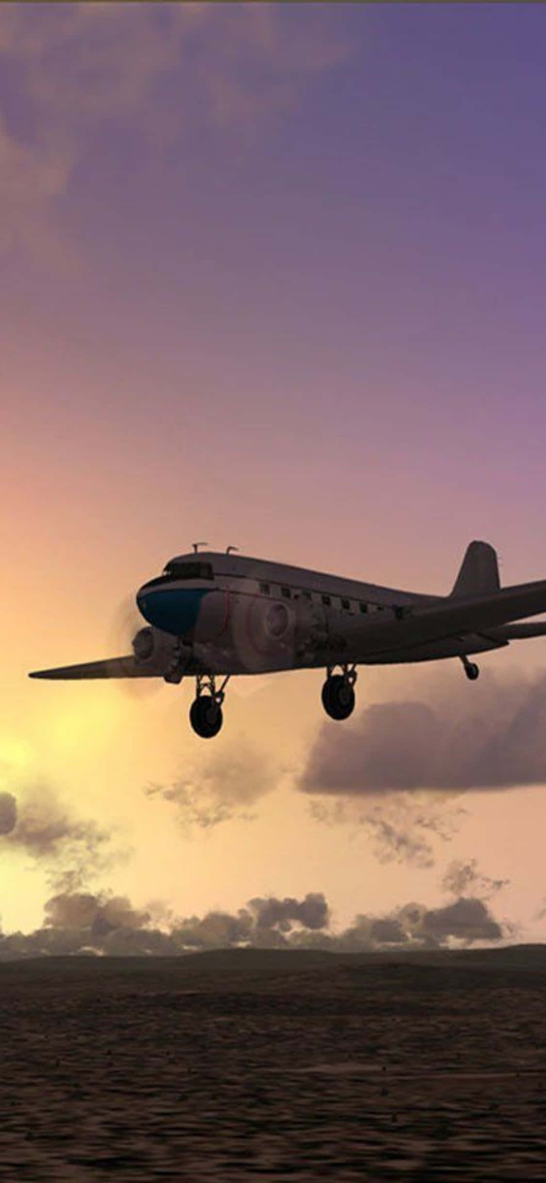 iPhone Xs Microsoft Flight Simulator 桌布 壁紙 — 一架復古螺旋槳飛機在紋理豐富的景觀上空，對著充滿活力的日落天空下降。