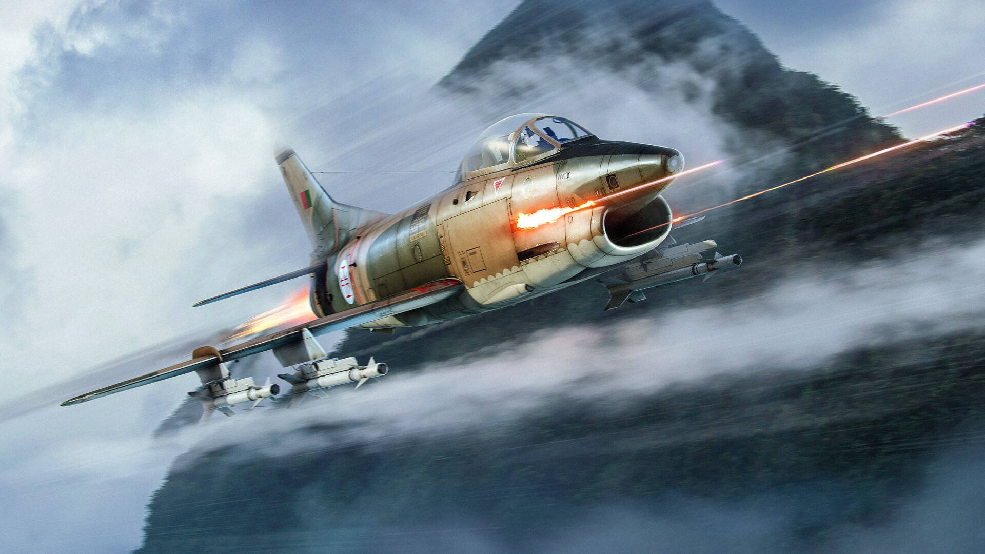 Jets 桌布 壁紙 — 一架戰鬥機穿過暴風雲，在崎嶇的山脈上空發射飛彈，留下熾熱的尾跡。
