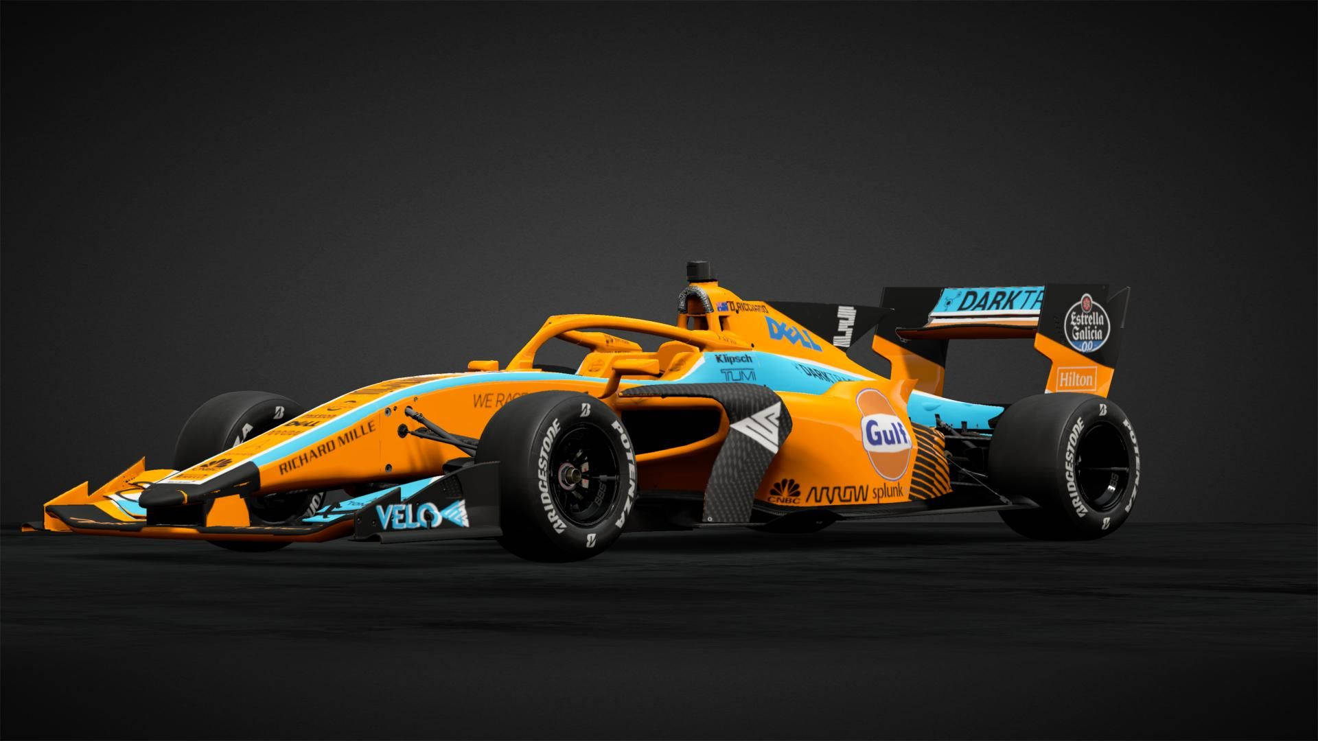 F1 桌布 壁紙 — 一架時尚的橙色和藍色一級方程式賽車，帶有贊助商標誌，在深色工作室背景下展示。