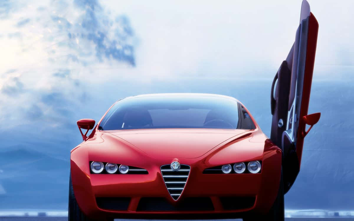 Alfa Romeo Brera 桌布 壁紙 — 一架時尚的紅色愛快羅密歐跑車，鷗翼門打開，背景是陰天。