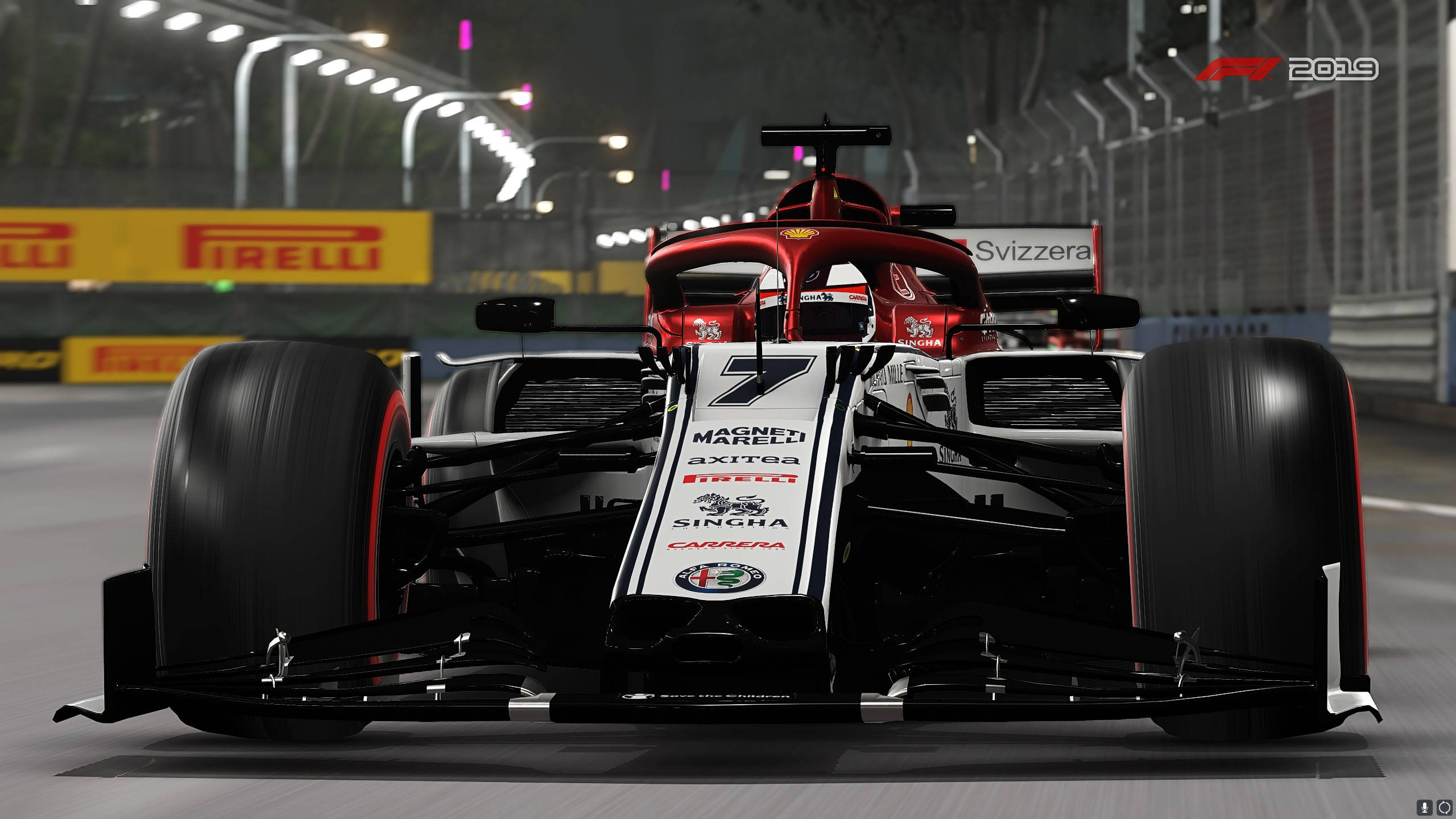 F1 2019 壁紙 桌布 壁紙 — 一架時尚的紅黑色一級方程式賽車，車號7，在夜間明亮的賽道燈光下行駛。